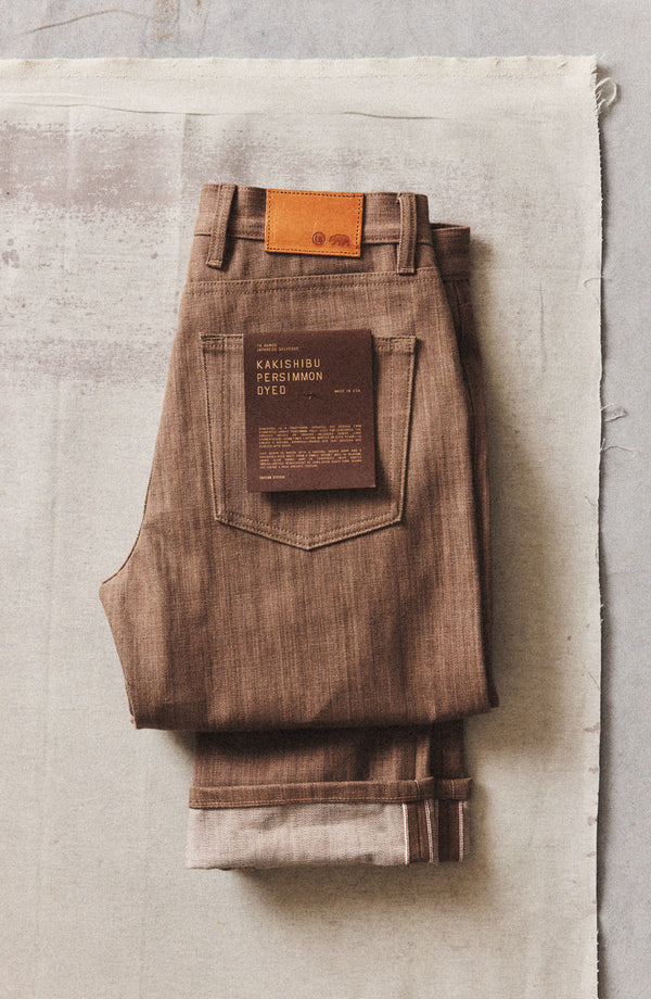 folded flatlay of The Straight Jean in Kakishibu Selvedge
