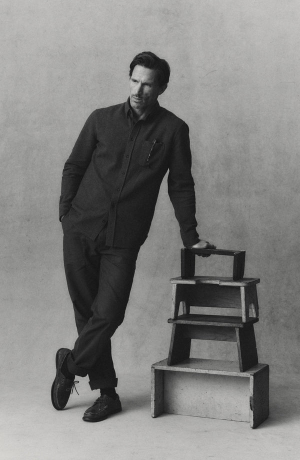 fit model showing off the pocket on The Surplus Pant in Faded Black Reverse Sateen
