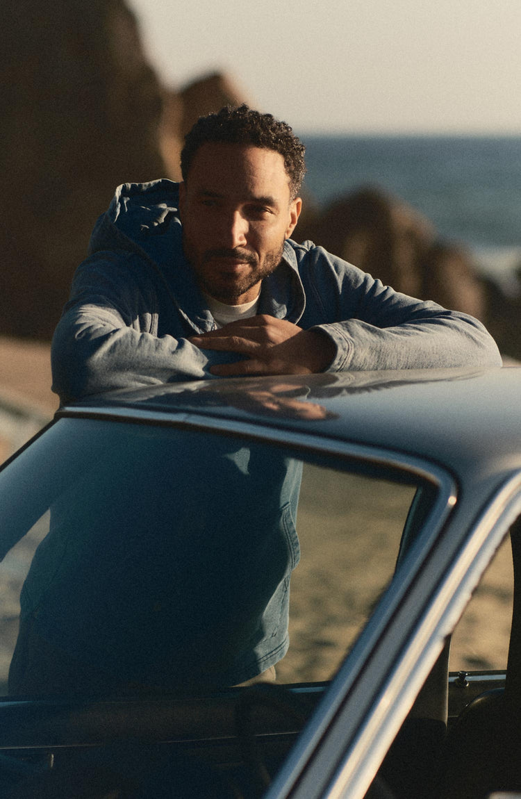 fit model posing in The Baja Pullover in Washed Indigo Terry