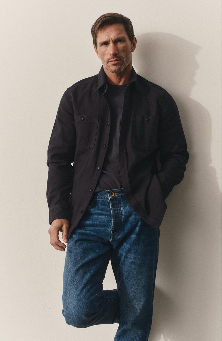 fit model posing in The Dispatch Shirt in Navy Broken Twill