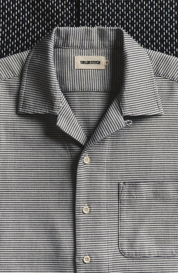 editorial flatlay of The Hawthorne Shirt in Blue Pin Dot Dobby