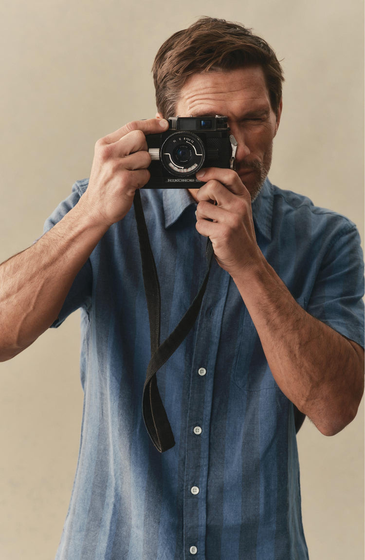 fit model posing in The Short Sleeve California in Blue Stone Stripe Hemp
