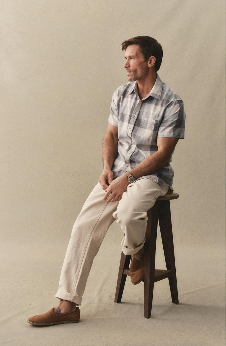 fit model posing in The Short Sleeve California in Overcast Check Hemp