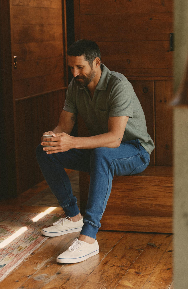 fit model posing in The Sunset Pant in Washed Indigo Terry