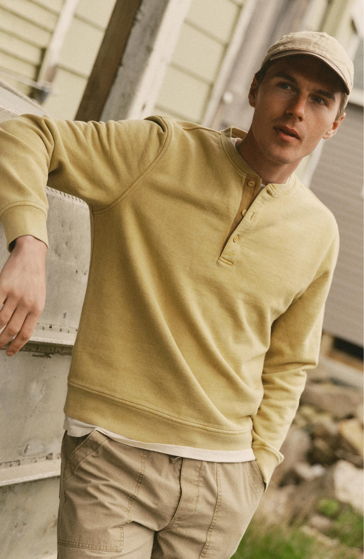 fit model posing in The Sunset Henley in Washed Goldfinch Terry