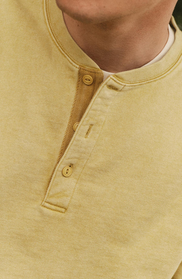 fit model showing off the collar on The Sunset Henley in Washed Goldfinch Terry