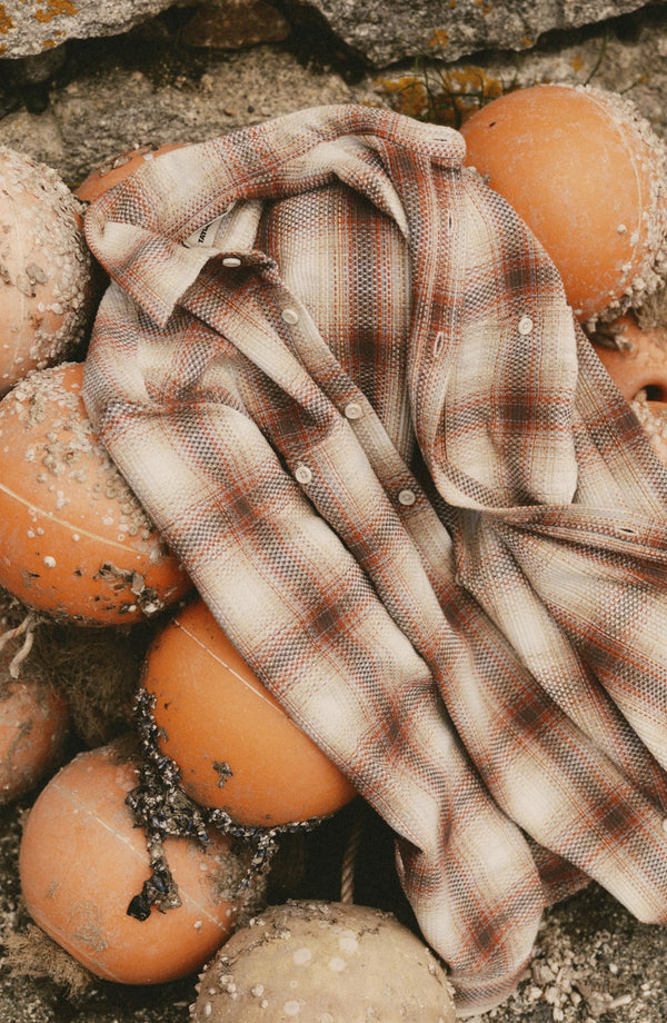 editorial image of The Utility Shirt in Seaside Check Sashiko on balls