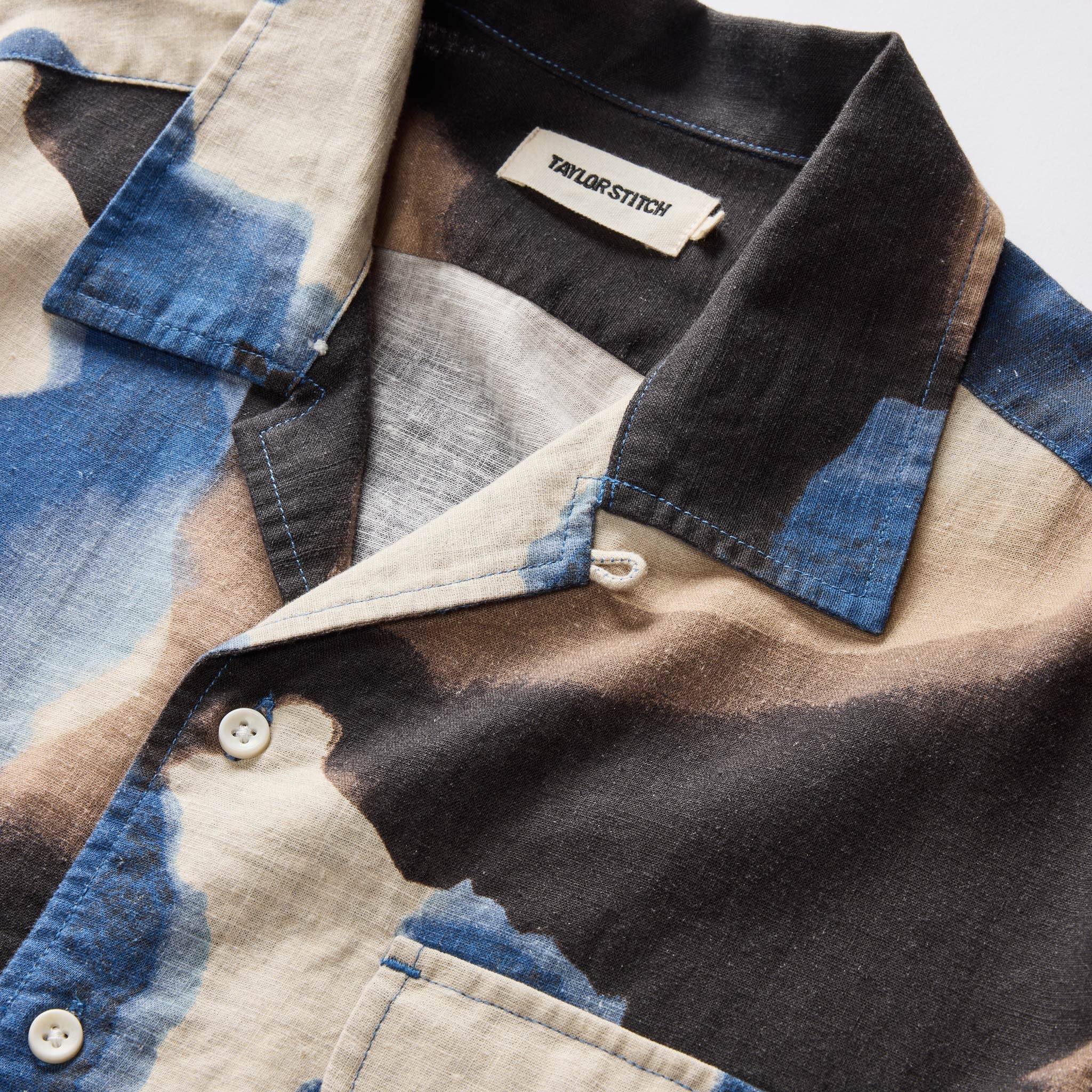 material shot of the collar on The Short Sleeve Carter in Dark Navy Abstract, Wovens by Taylor Stitch