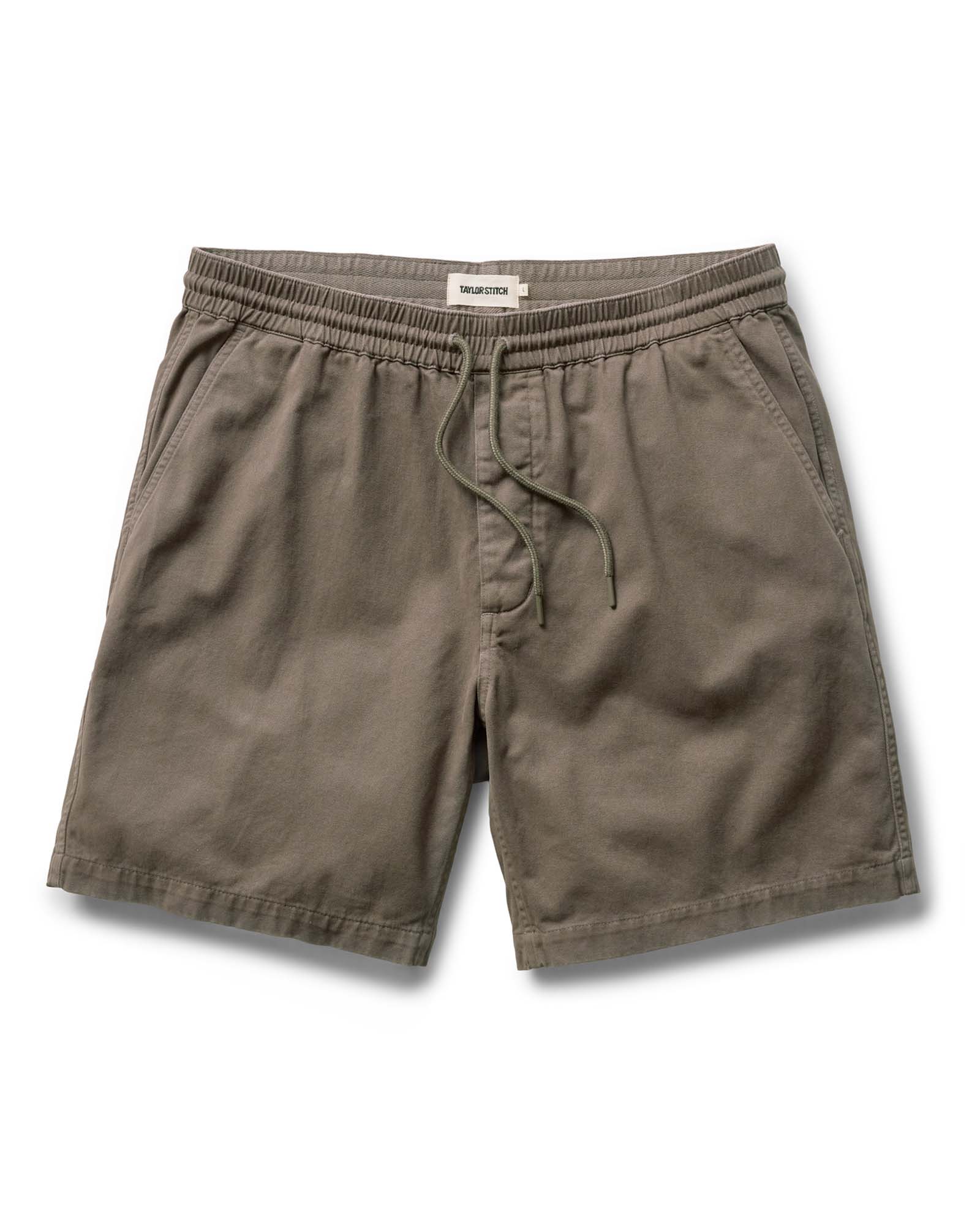 flatlay of The Apres Short in Organic Espresso Foundation Twill, Bottoms by Taylor Stitch