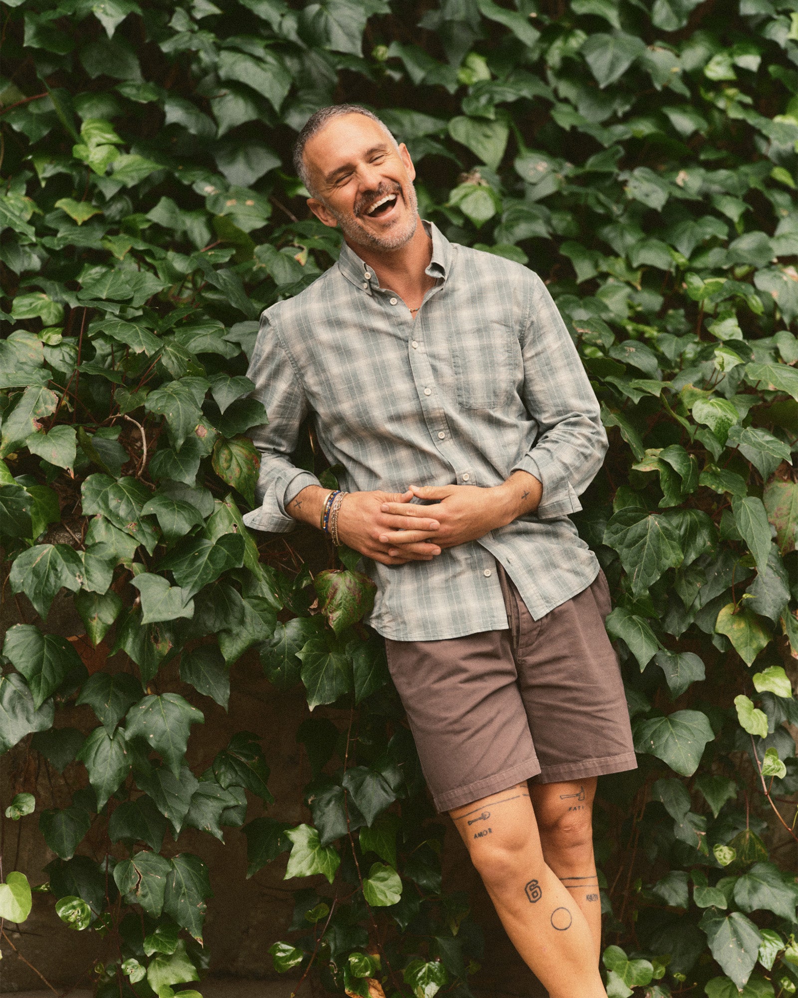 fit model posing in The Apres Short in Organic Espresso Foundation Twill, Bottoms by Taylor Stitch
