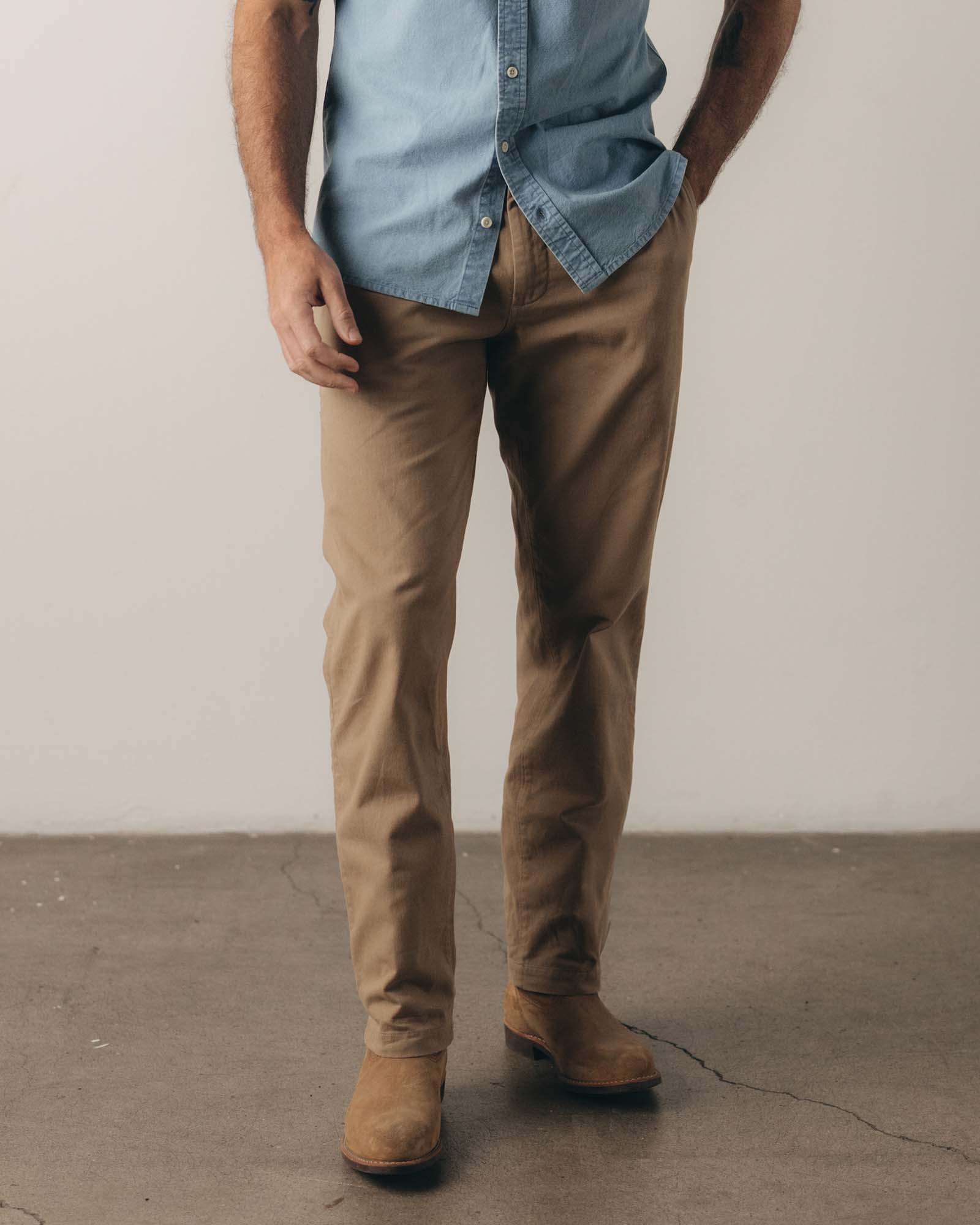 fit model posing in The Democratic Foundation Pant in Organic Khaki, Bottoms by Taylor Stitch