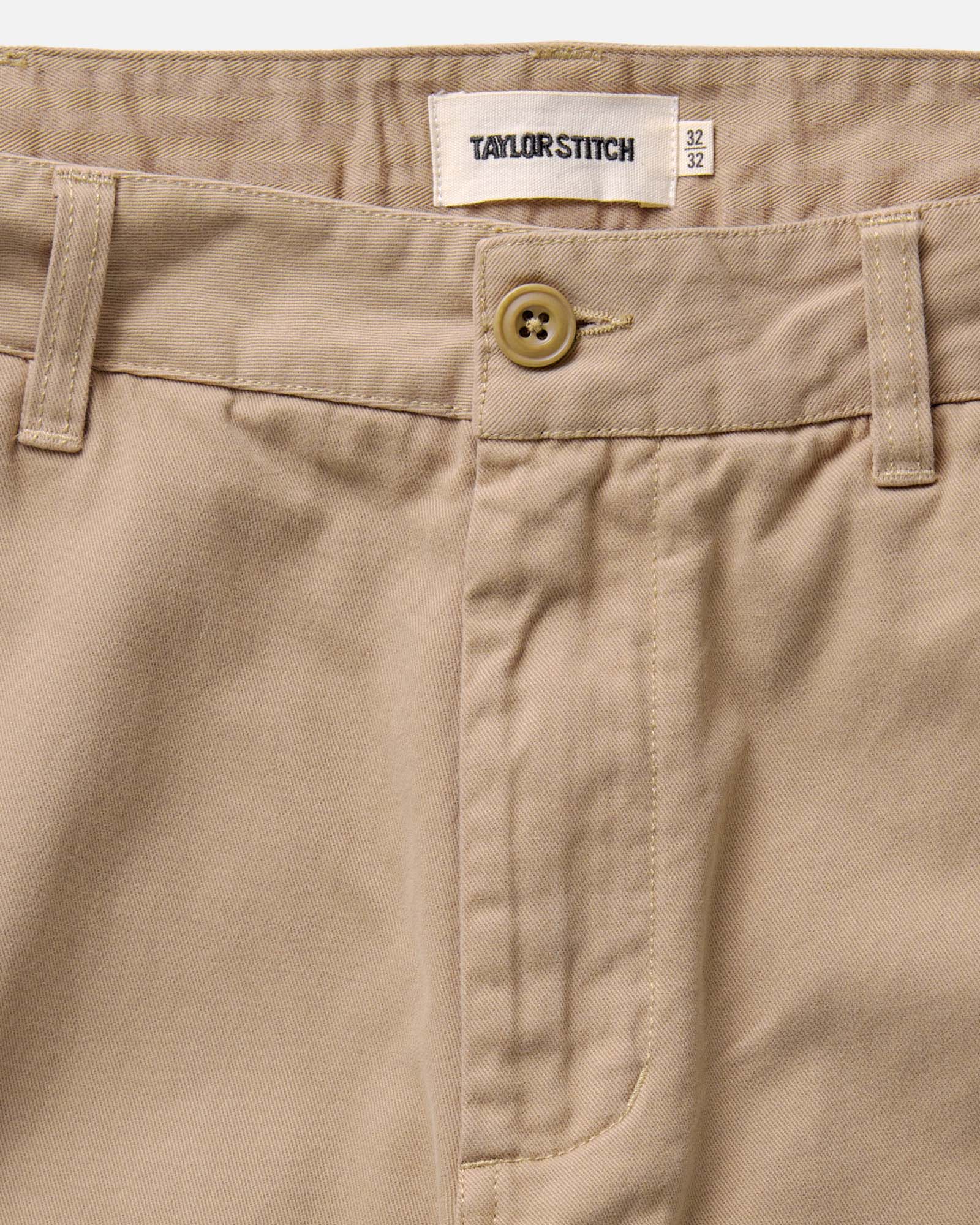 fit model standing wearing The Democratic Foundation Pant in Organic Khaki, Bottoms by Taylor Stitch