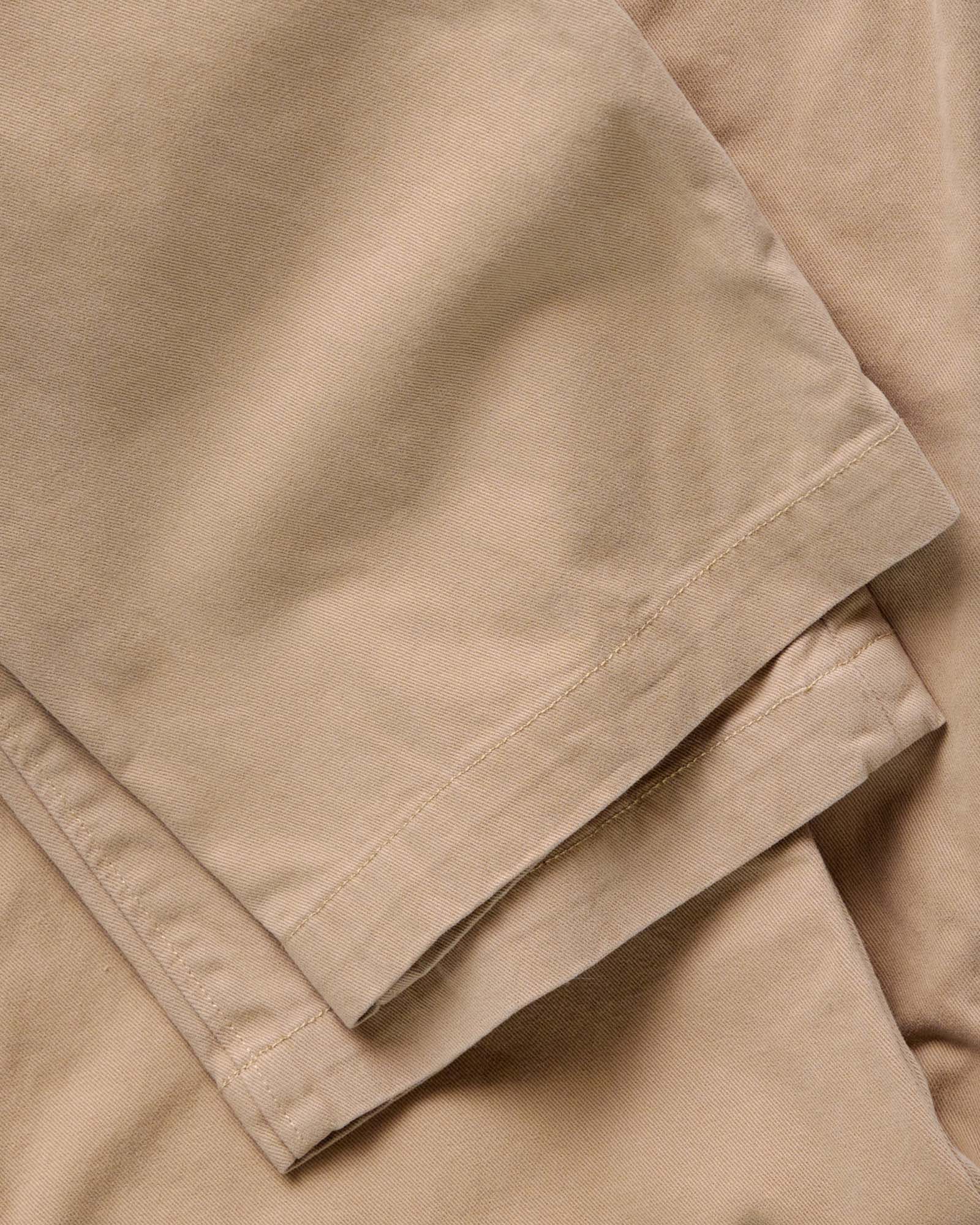 material shot of the zipper on The Democratic Foundation Pant in Organic Khaki, Bottoms by Taylor Stitch