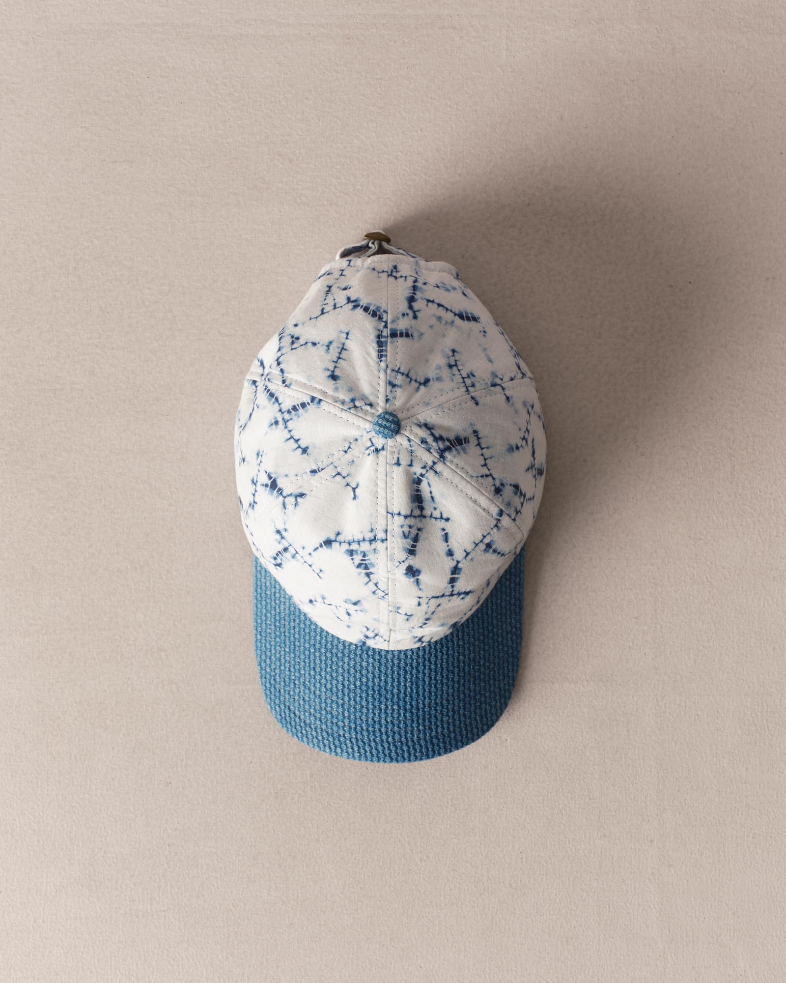 image of The Taylor Stitch x Hypeadelic Cap v2.01 hanging