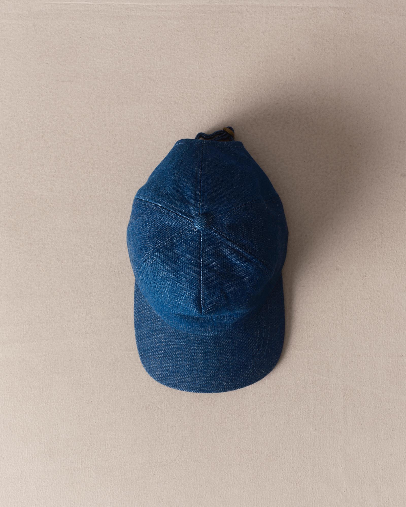 editorial image of The Taylor Stitch x Hypeadelic Cap v2.05 hanging