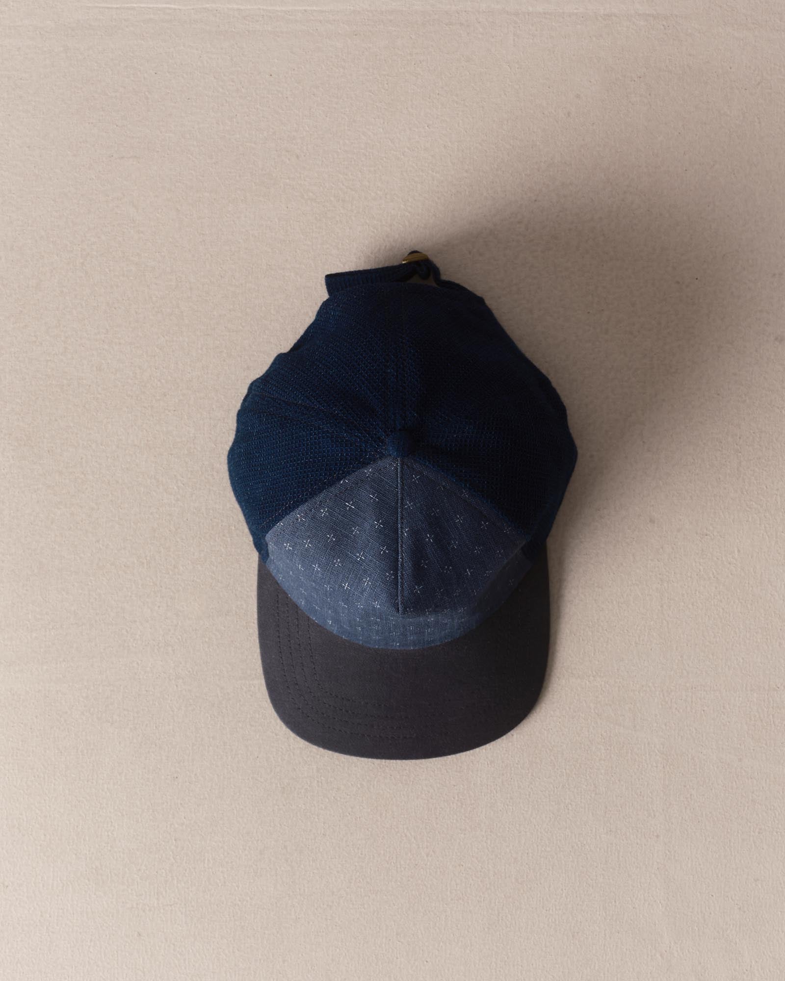 editorial image of The Taylor Stitch x Hypeadelic Cap v2.08 hanging