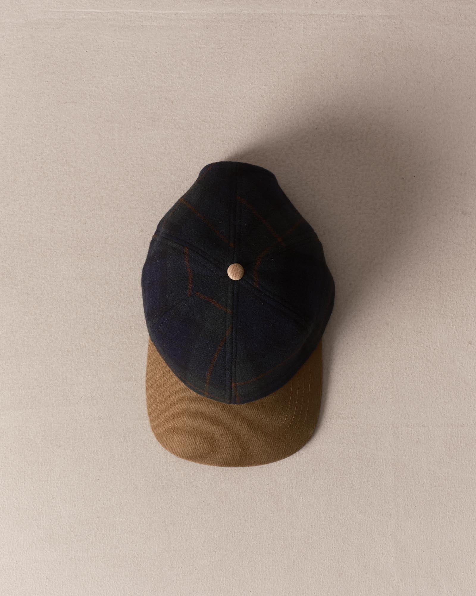editorial image of The Taylor Stitch x Hypeadelic Cap v2.16 hanging