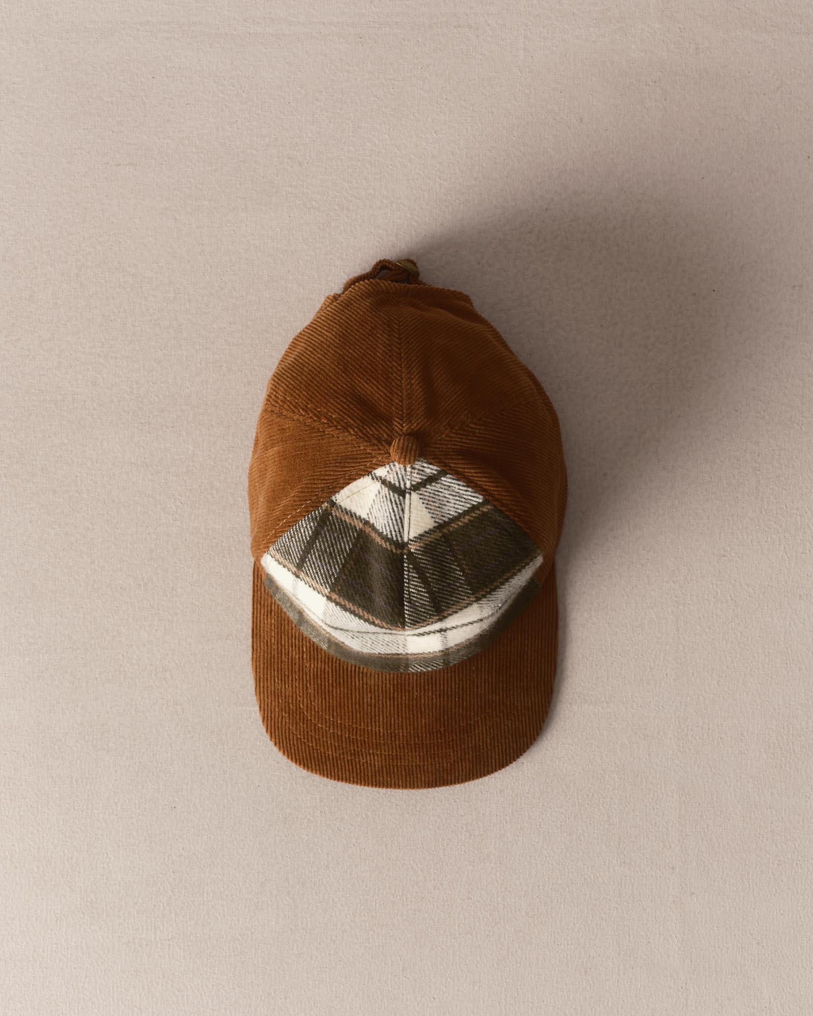 editorial image of The Taylor Stitch x Hypeadelic Cap v2.35 hanging