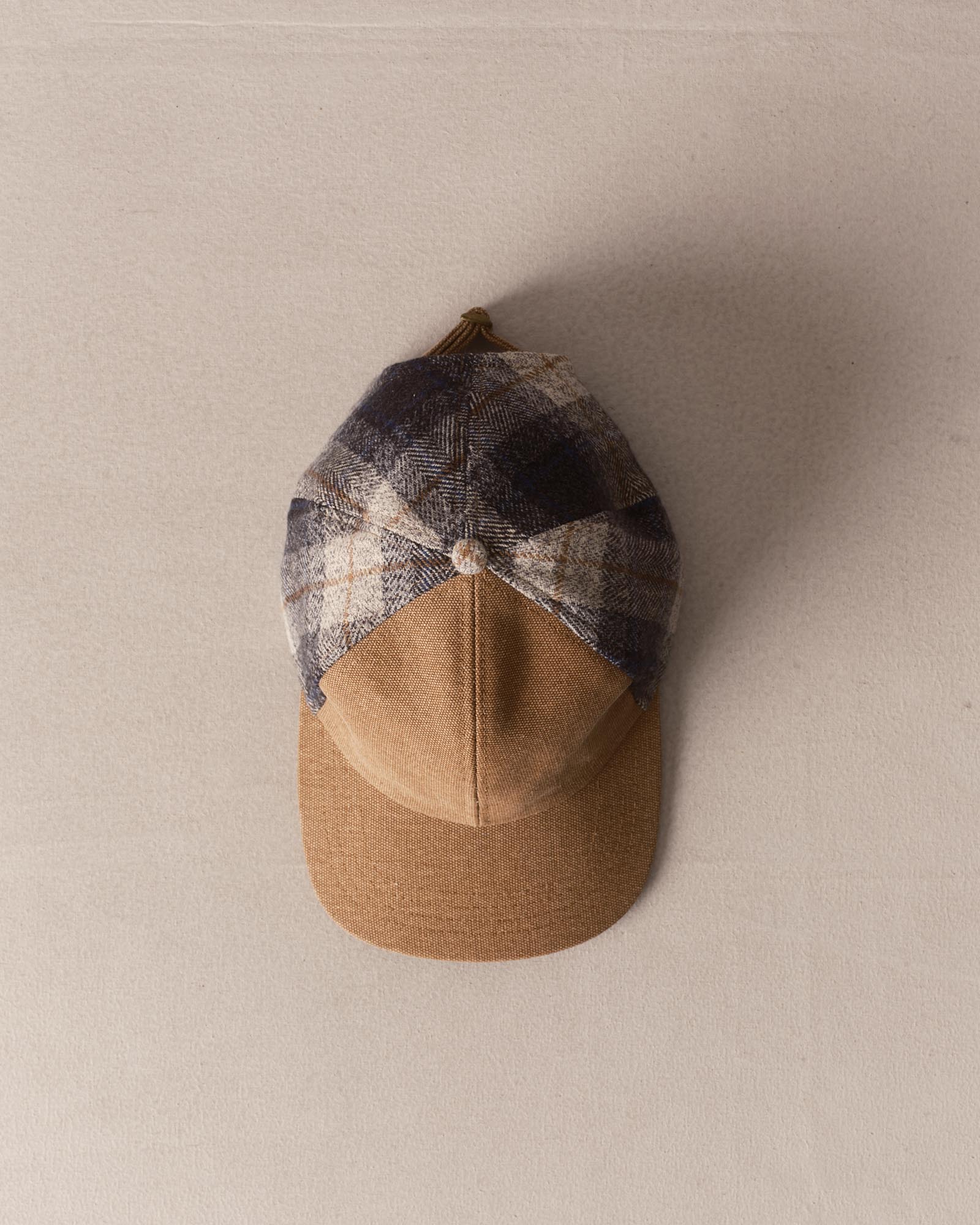 editorial image of The Taylor Stitch x Hypeadelic Cap v2.38 hanging