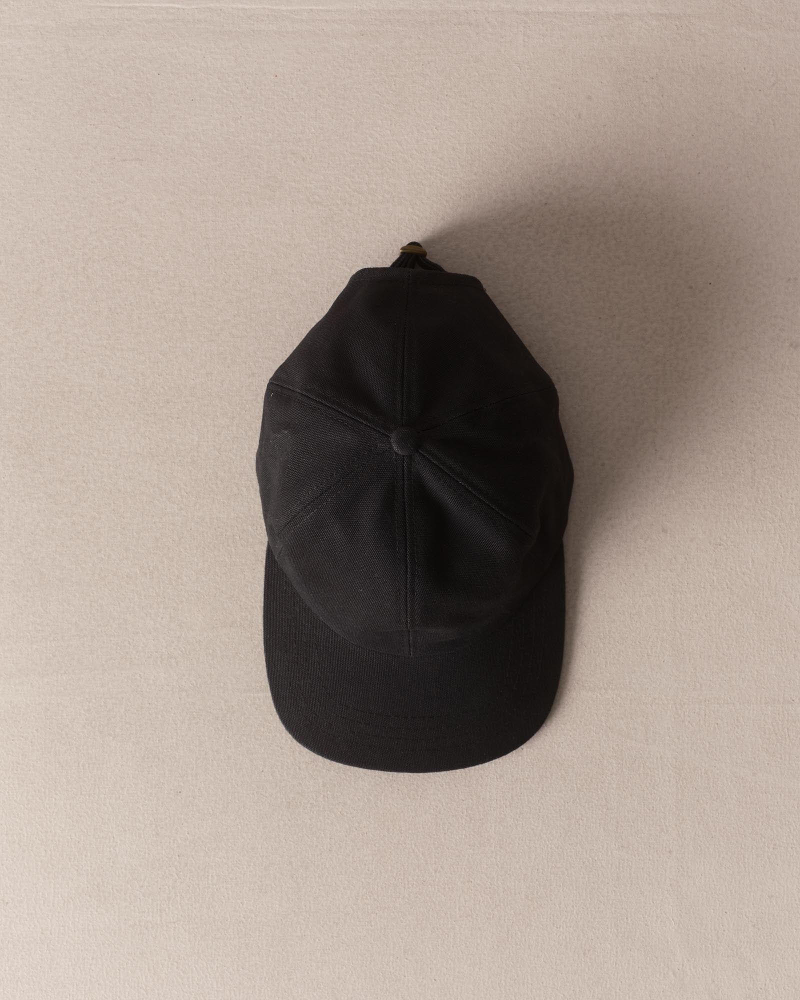 editorial image of The Taylor Stitch x Hypeadelic Cap v2.50 hanging