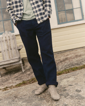 editorial flatlay of The Breakwater Pant in Rinsed Indigo Sashiko