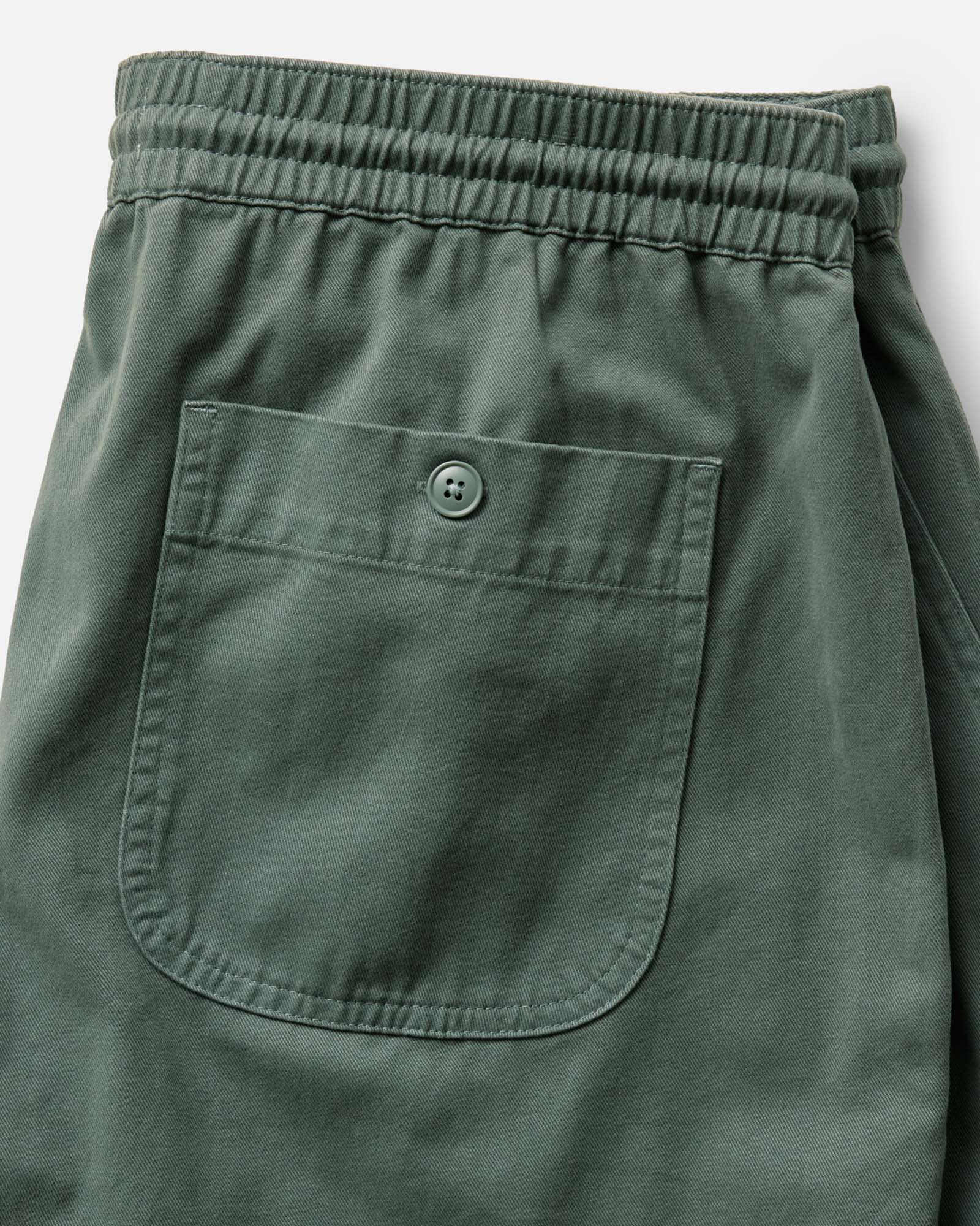 flatlay of the back of The Apres Short in Organic Deep Sea Foundation Twill, Bottoms by Taylor Stitch