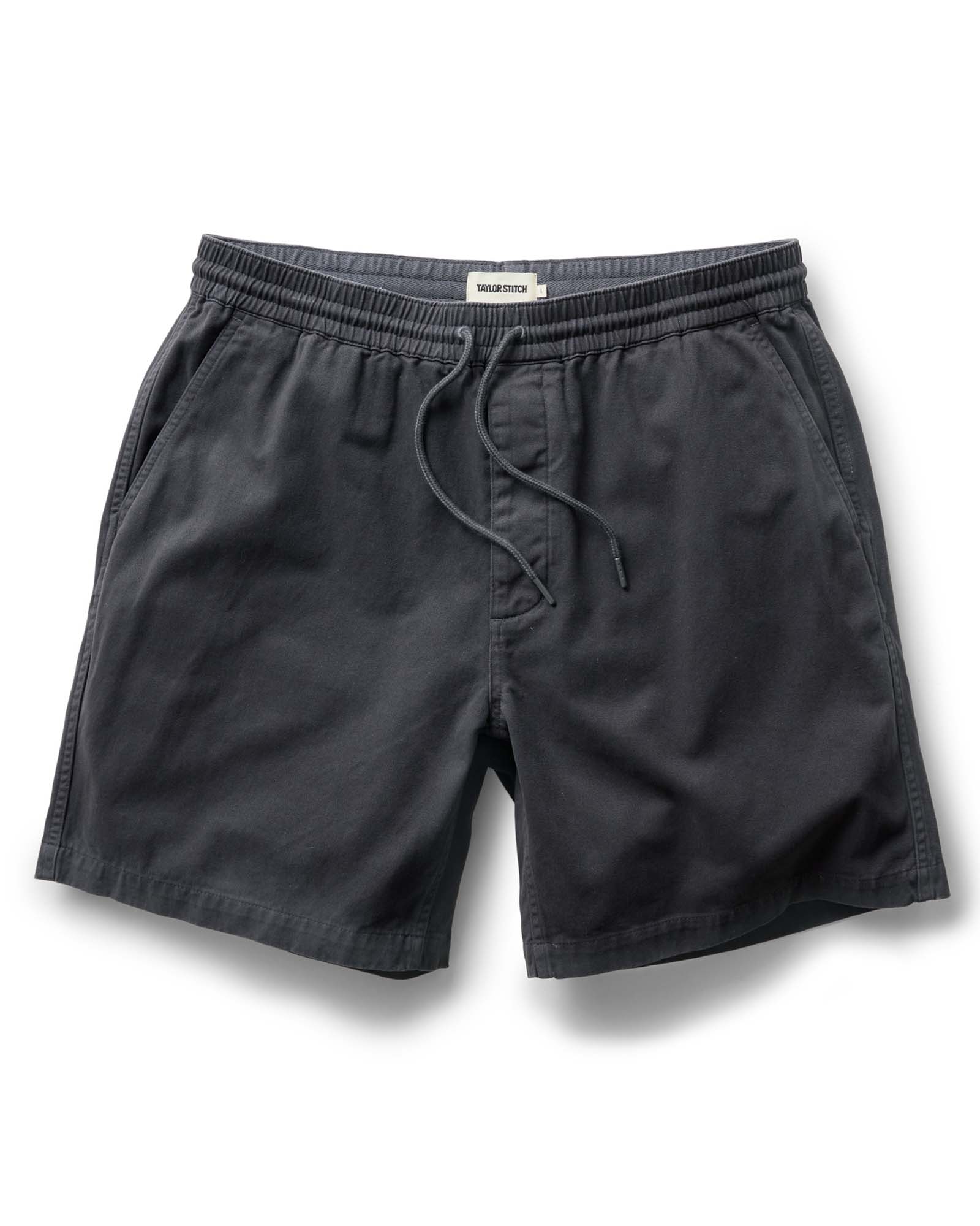 flatlay of The Apres Short in Organic Faded Black Foundation Twill, Bottoms by Taylor Stitch
