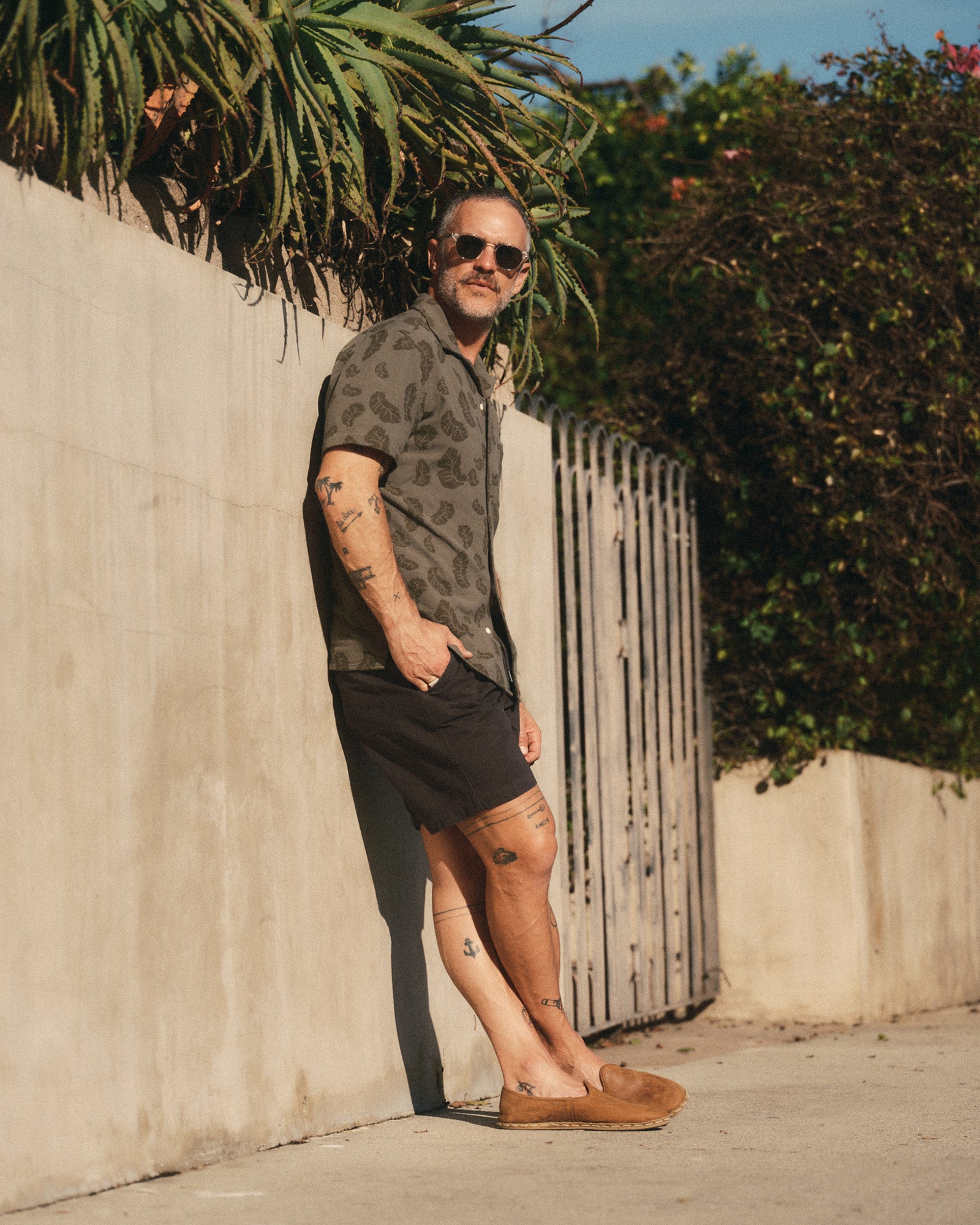 fit model showing off The Apres Short in Organic Faded Black Foundation Twill, Bottoms by Taylor Stitch