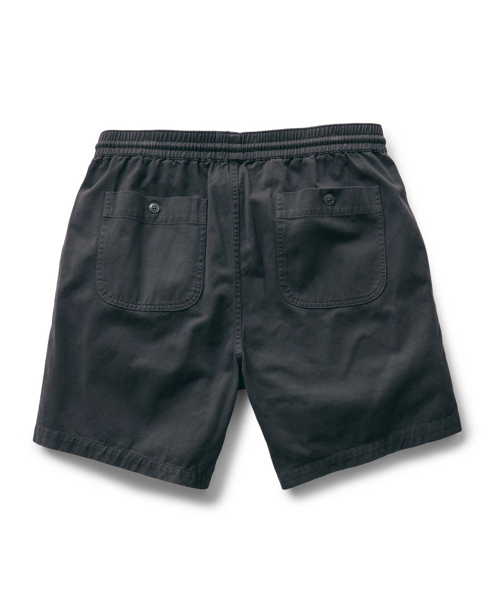 flatlay of the back of The Apres Short in Organic Faded Black Foundation Twill, Bottoms by Taylor Stitch
