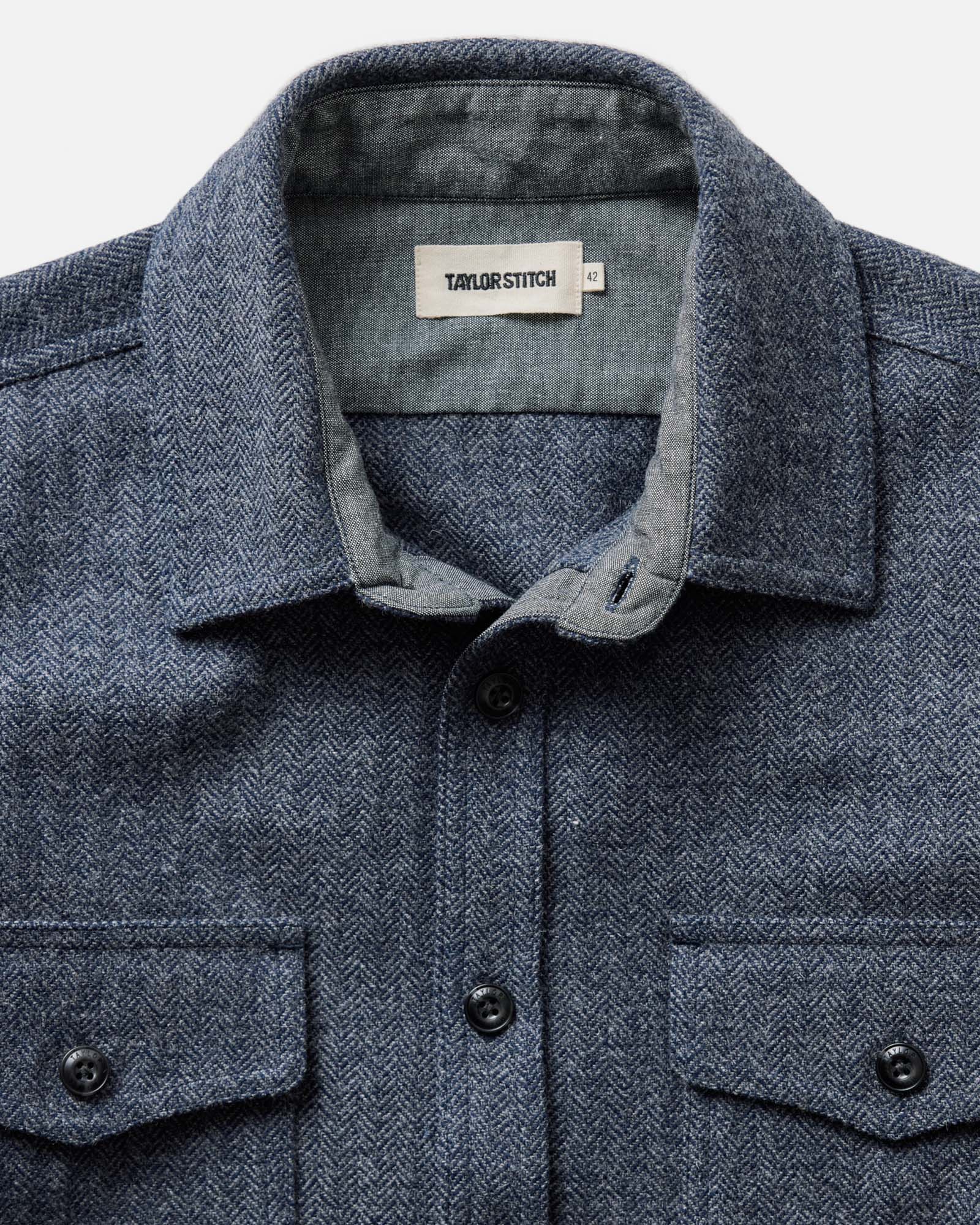 material shot of the collar on The CPO Overshirt in Indigo Ash Wool Herringbone, Wovens by Taylor Stitch
