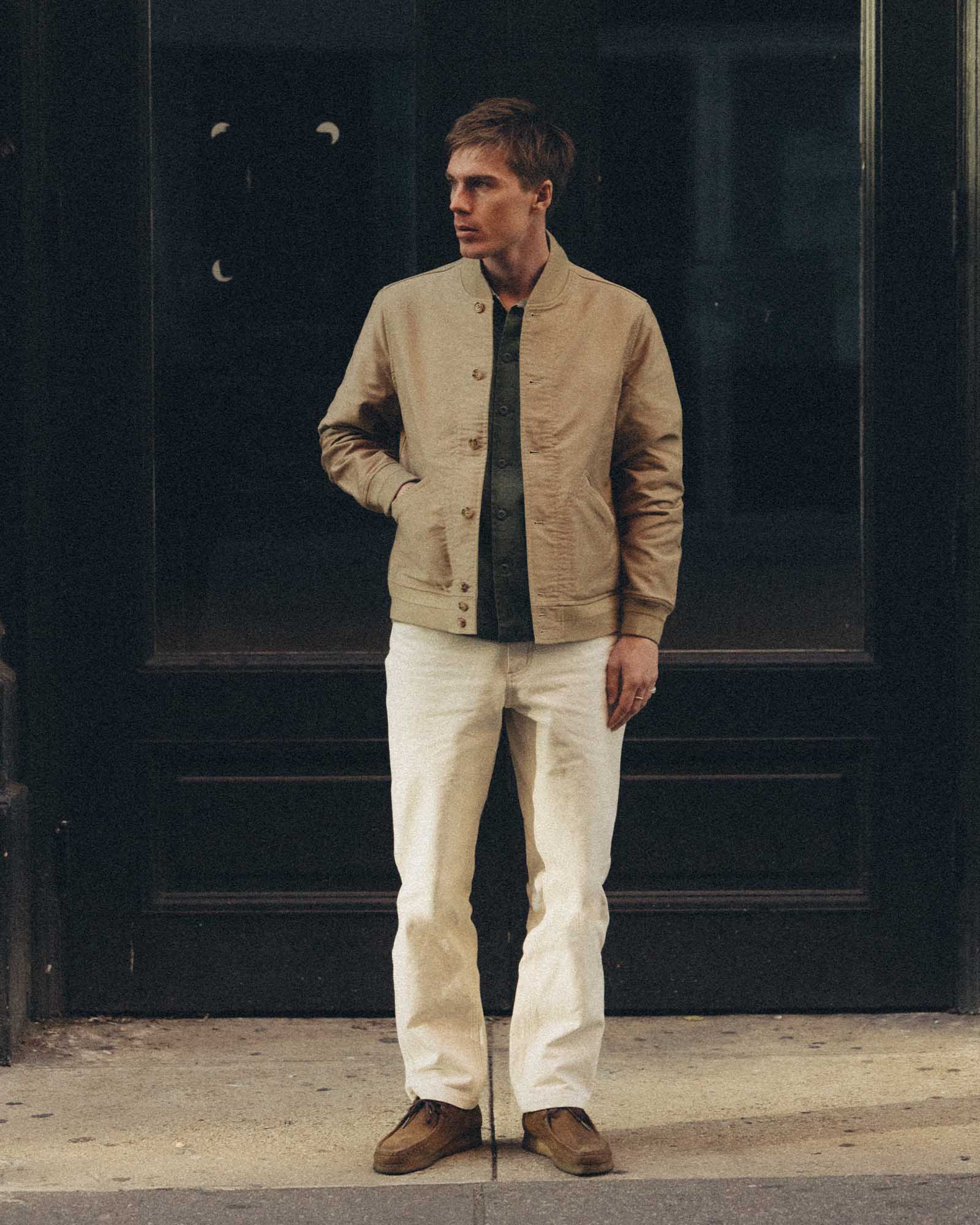 fit model posing in The Clark Bomber in Khaki Bedford Cord, Outerwear by Taylor Stitch