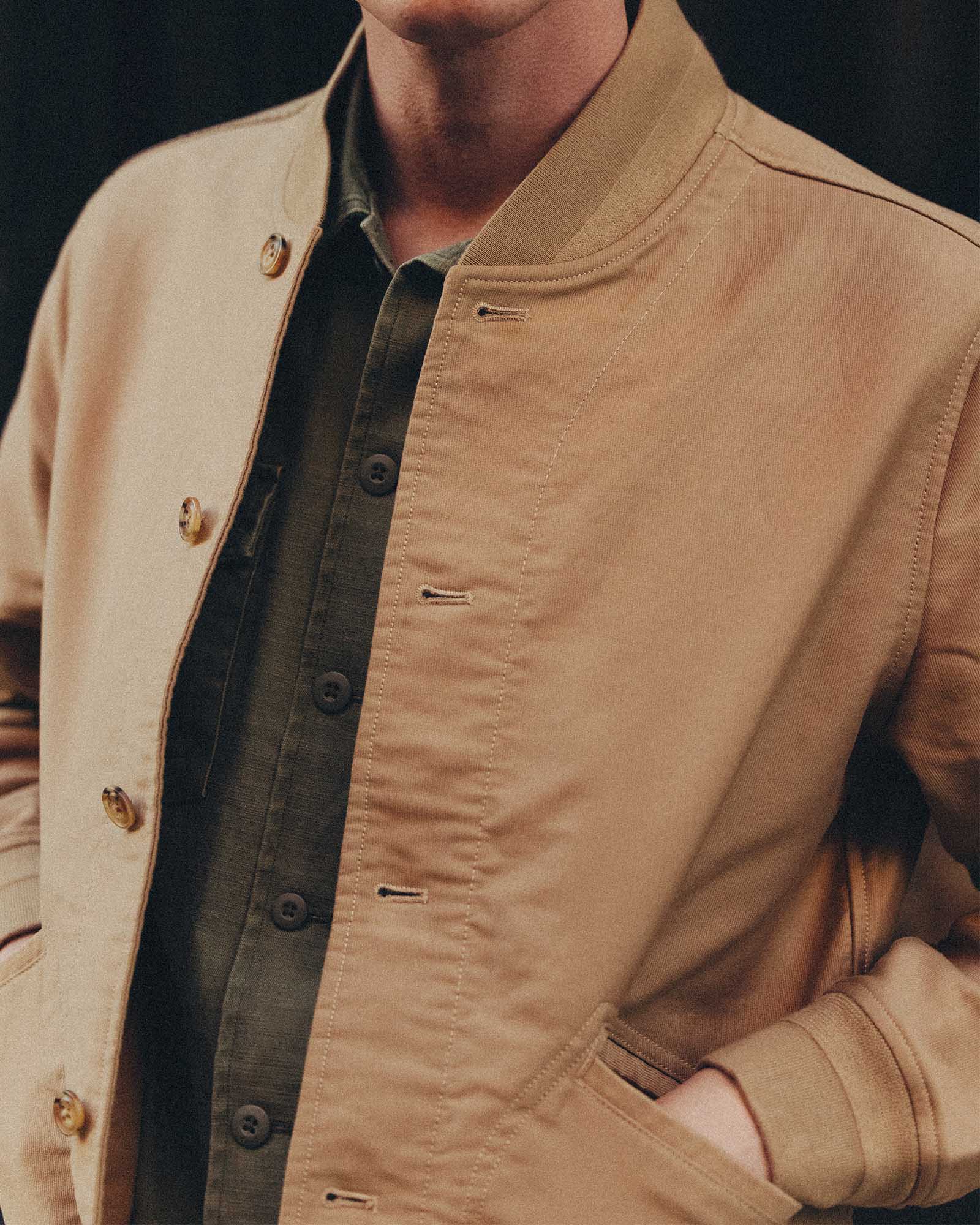 fit model showing off the buttons on The Clark Bomber in Khaki Bedford Cord, Outerwear by Taylor Stitch