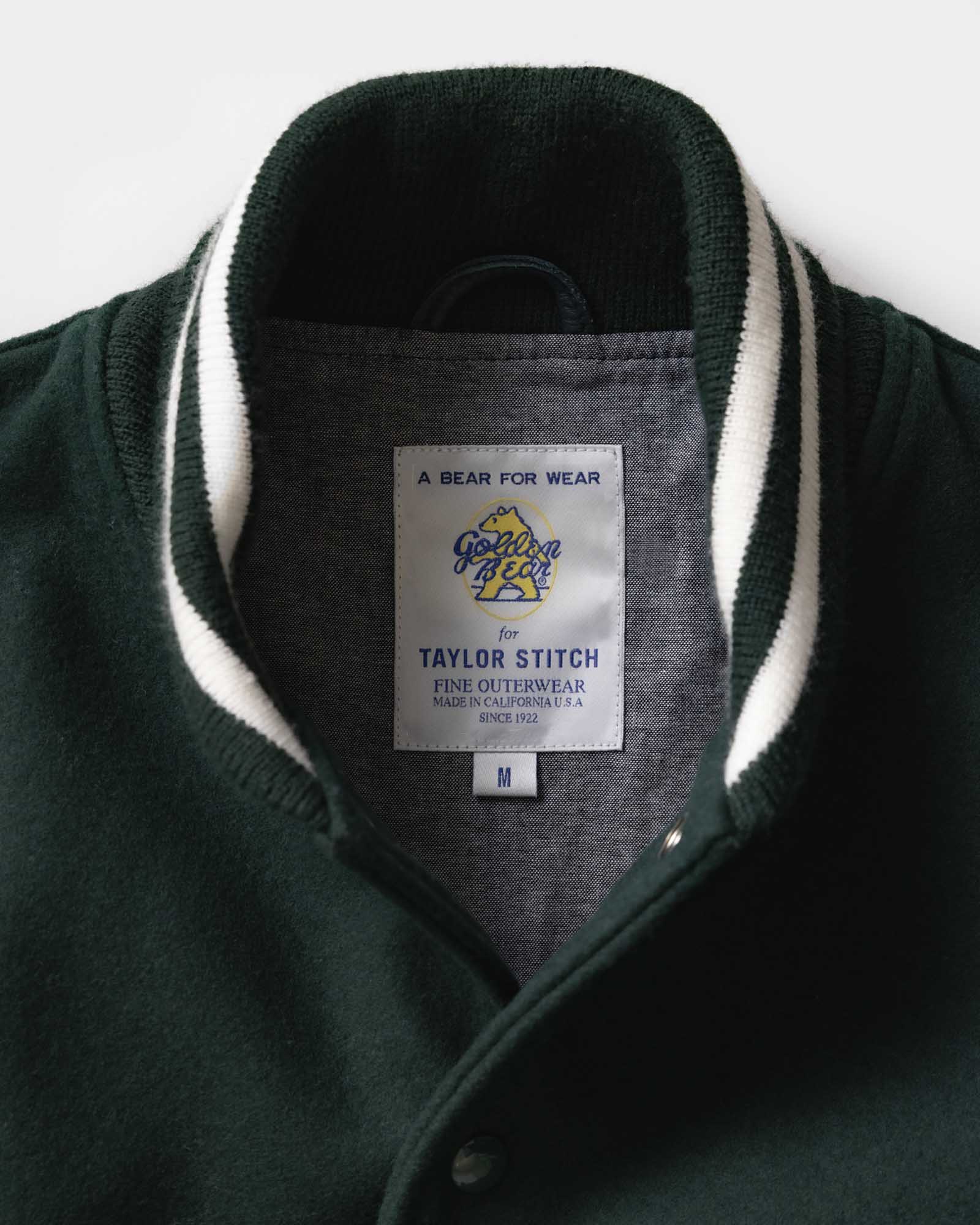 material shot of the collar on The Golden Bear Snap Bomber in Ivy Wool, Outerwear by Taylor Stitch