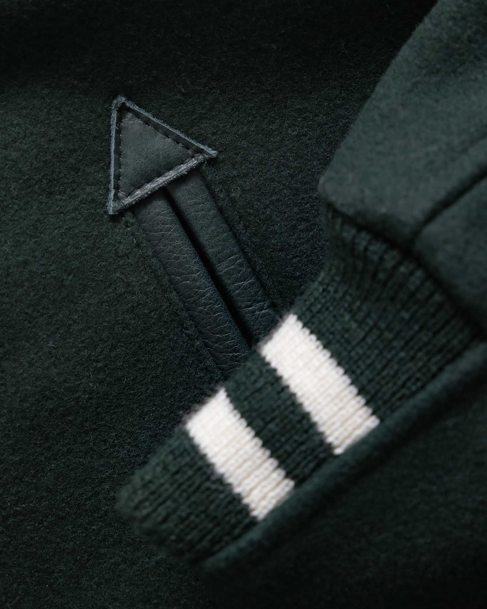 material shot of the cuff on The Golden Bear Snap Bomber in Ivy Wool, Outerwear by Taylor Stitch