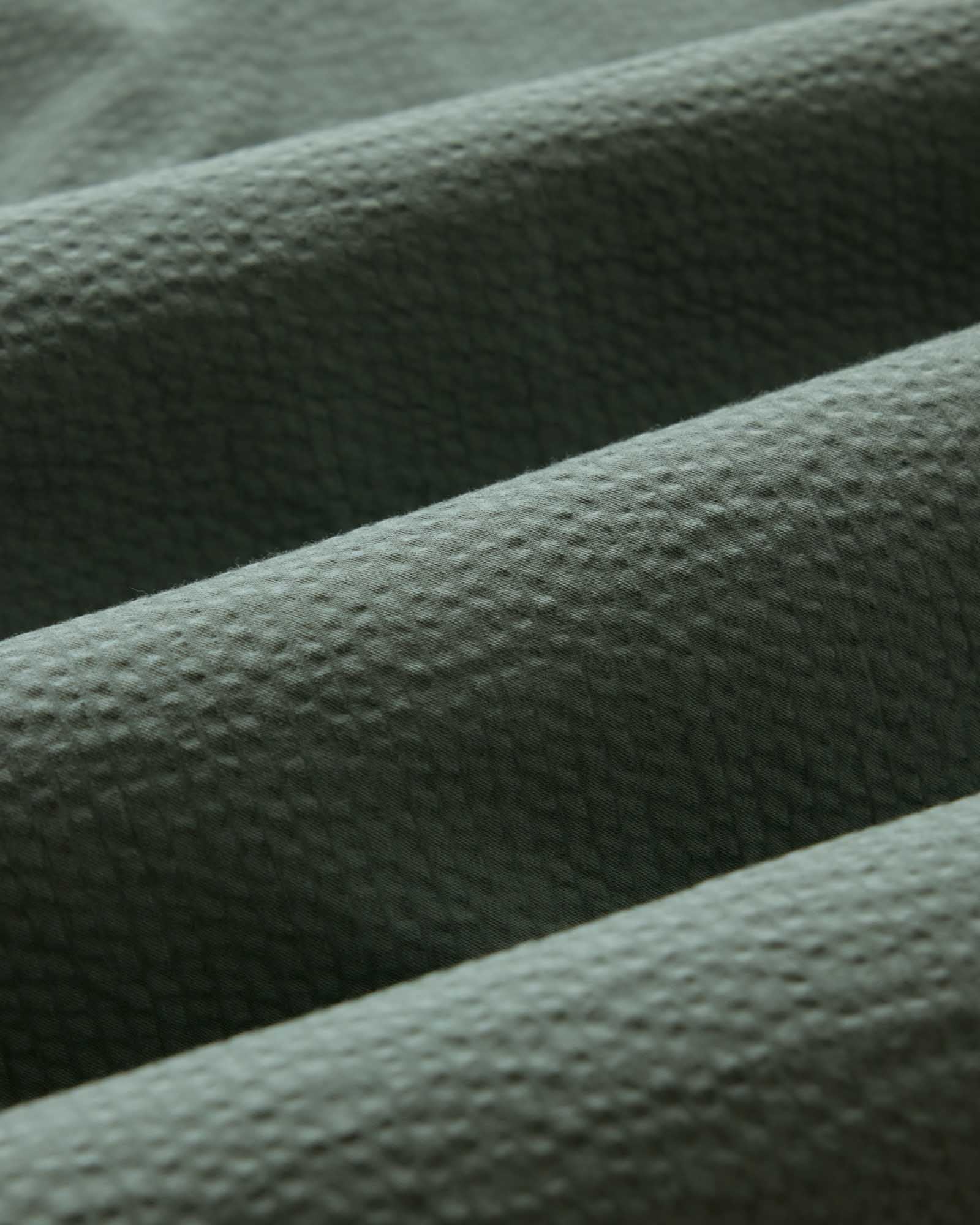 material shot of the fabric on The Jack in Deep Sea Seersucker, Wovens by Taylor Stitch