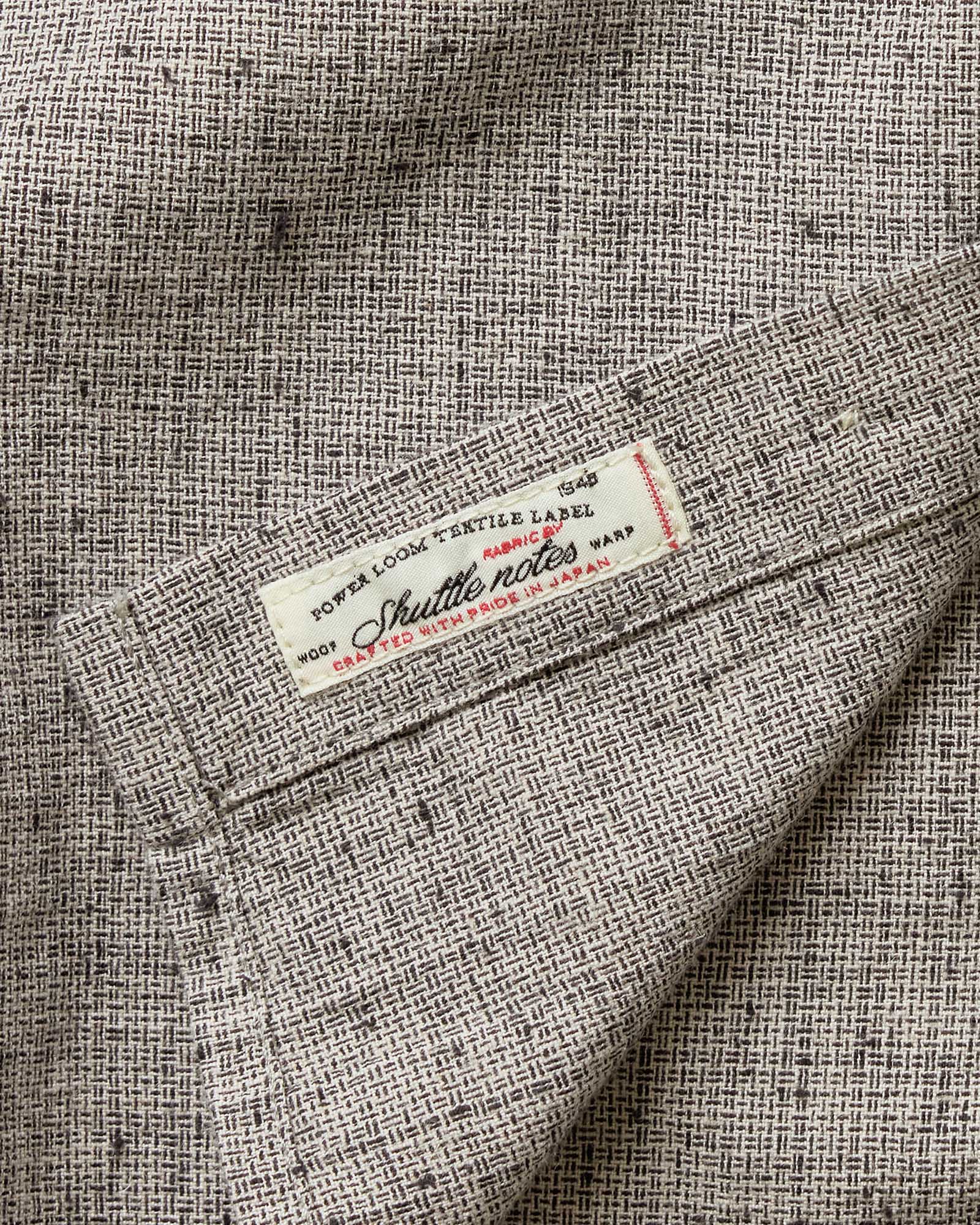 material shot of the tag on The Jack in Japanese Fog Nep, Wovens by Taylor Stitch