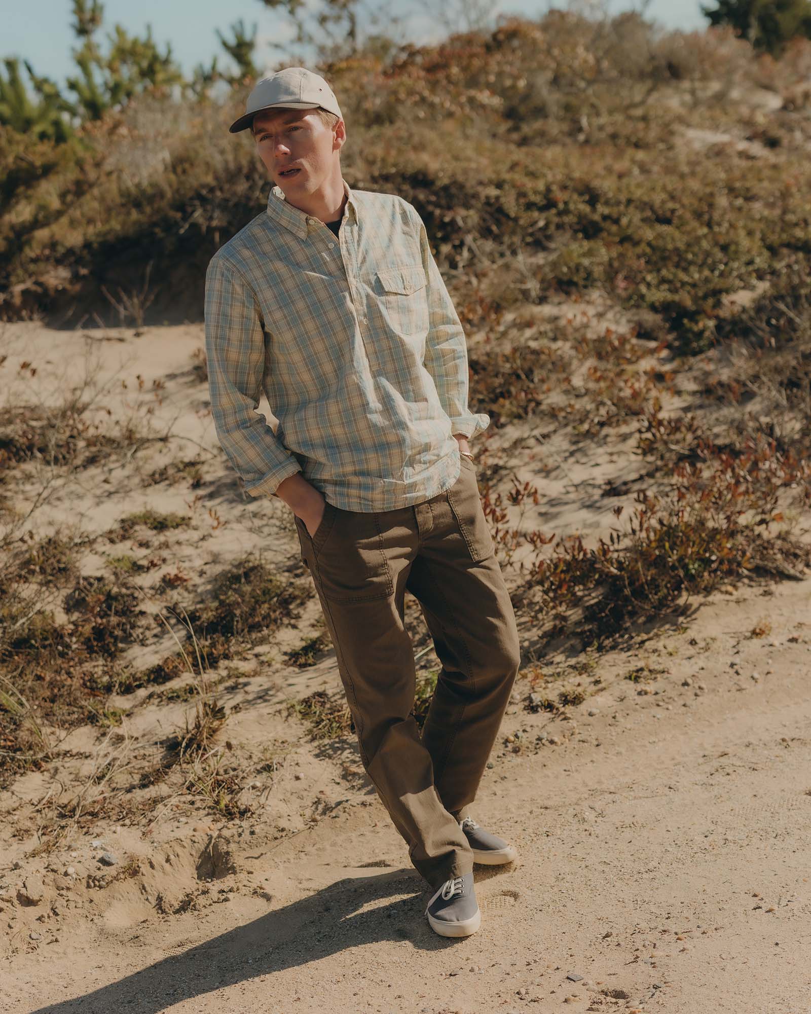 fit model walking wearing The Logan Popover in Blue Sky Plaid, Wovens by Taylor Stitch