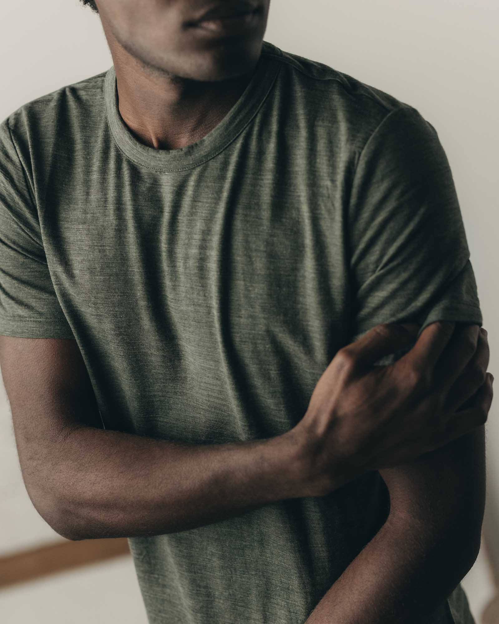 fit model showing off The Merino Tee in Heather Army, Knits by Taylor Stitch