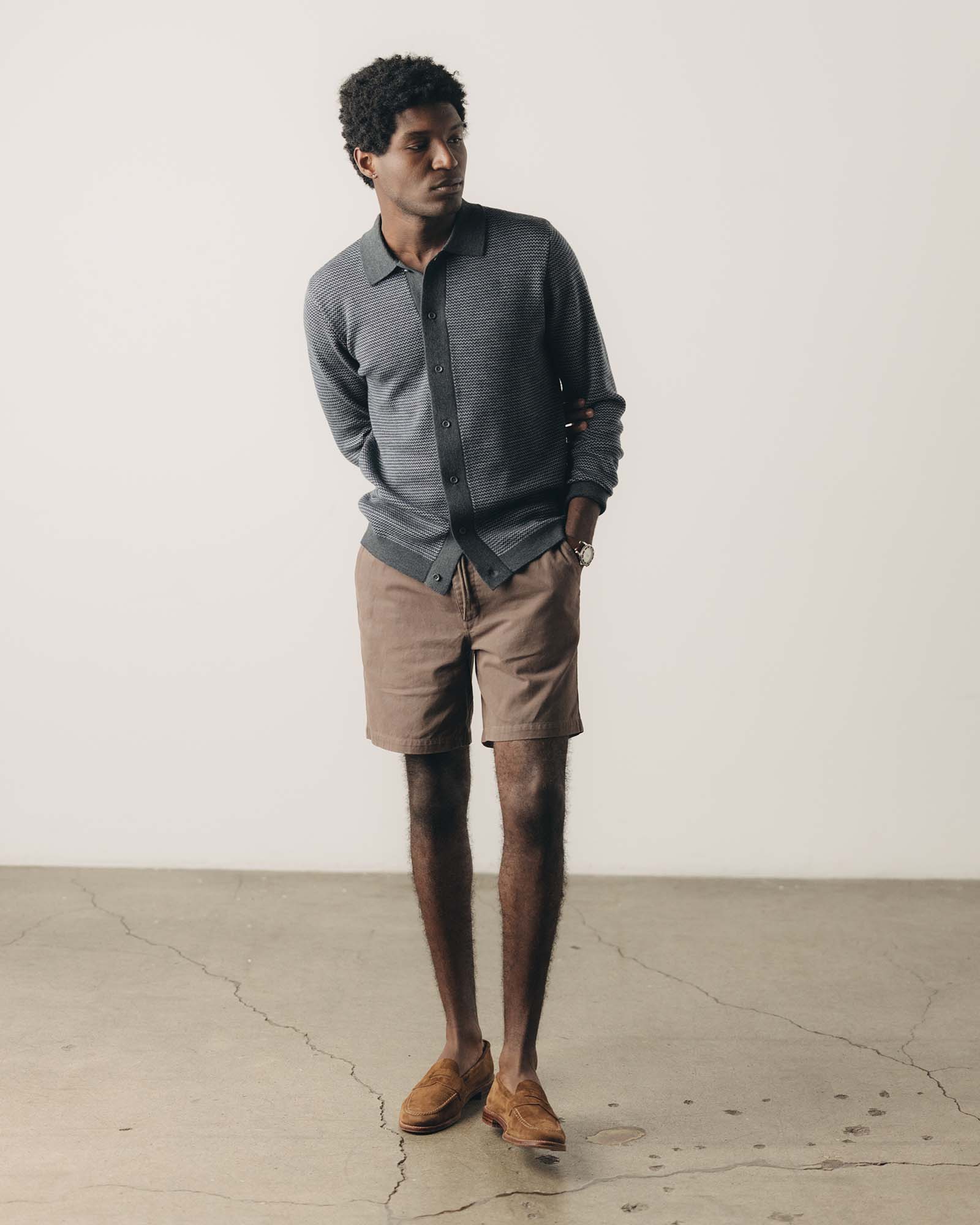 fit model showing off The Nichols Polo in Navy Birdseye Merino, Knits by Taylor Stitch