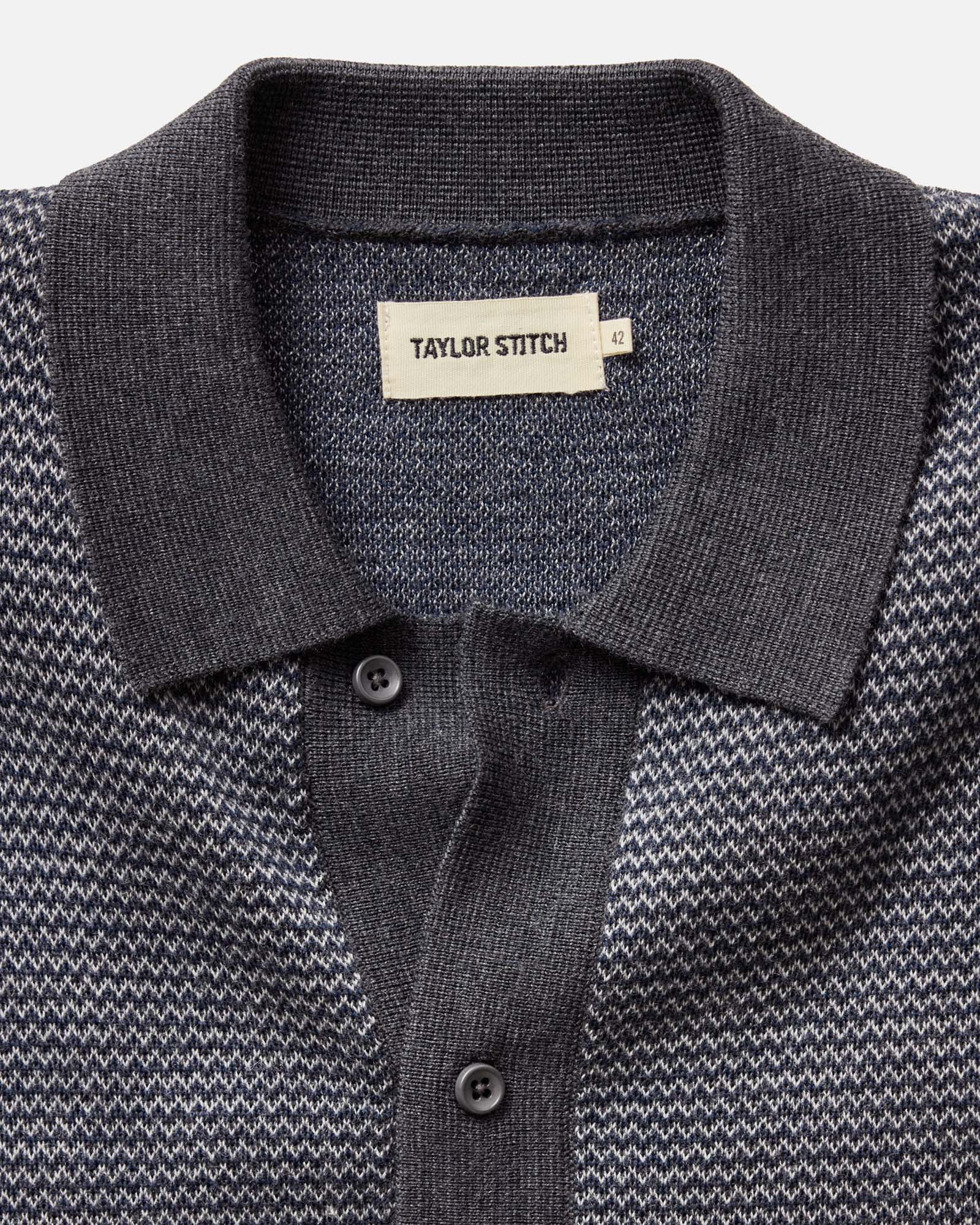 material shot of the collar on The Nichols Polo in Navy Birdseye Merino, Knits by Taylor Stitch