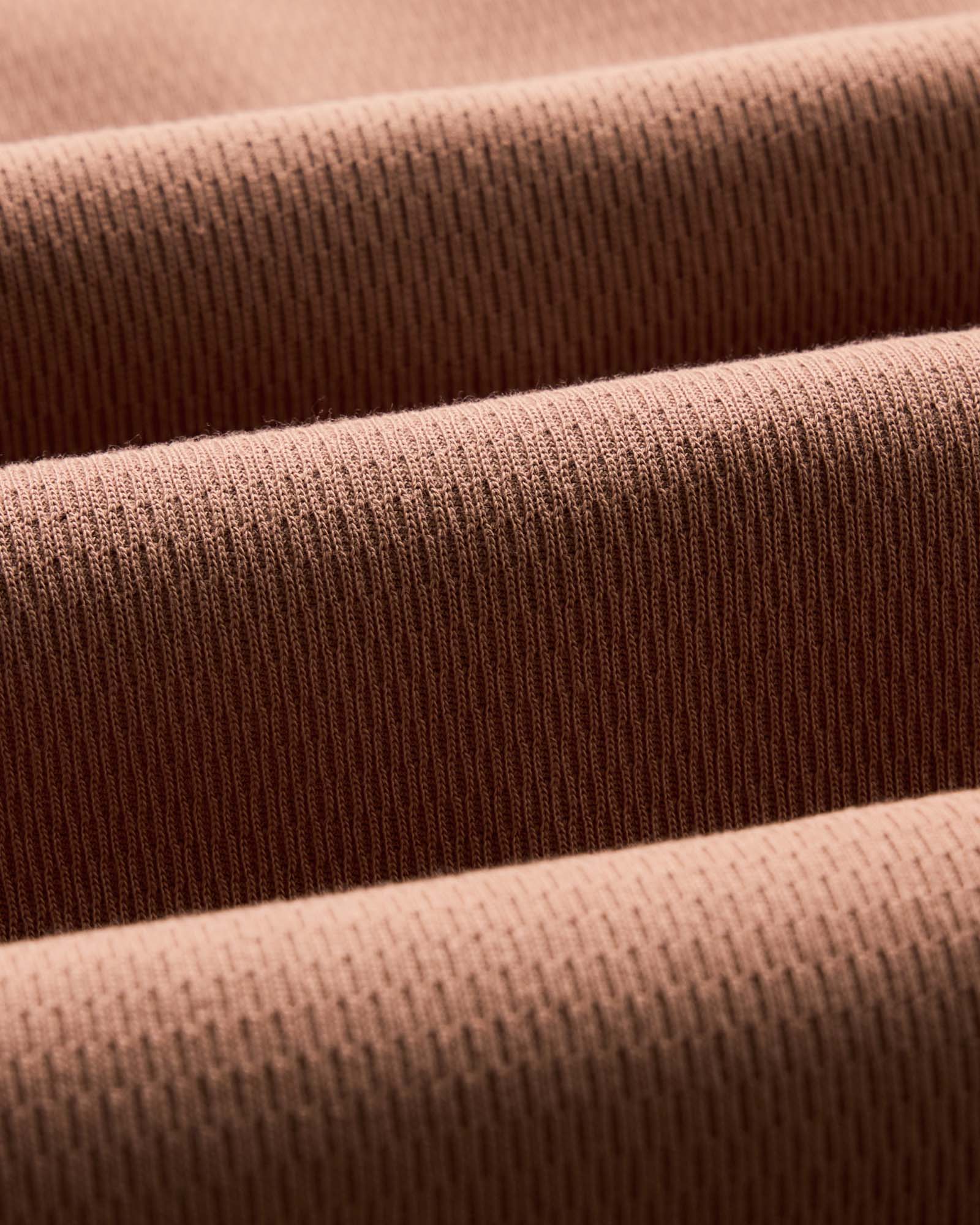 material shot of the fabric on The Organic Cotton Short Sleeve Crew in Faded Brick Waffle, Knits by Taylor Stitch
