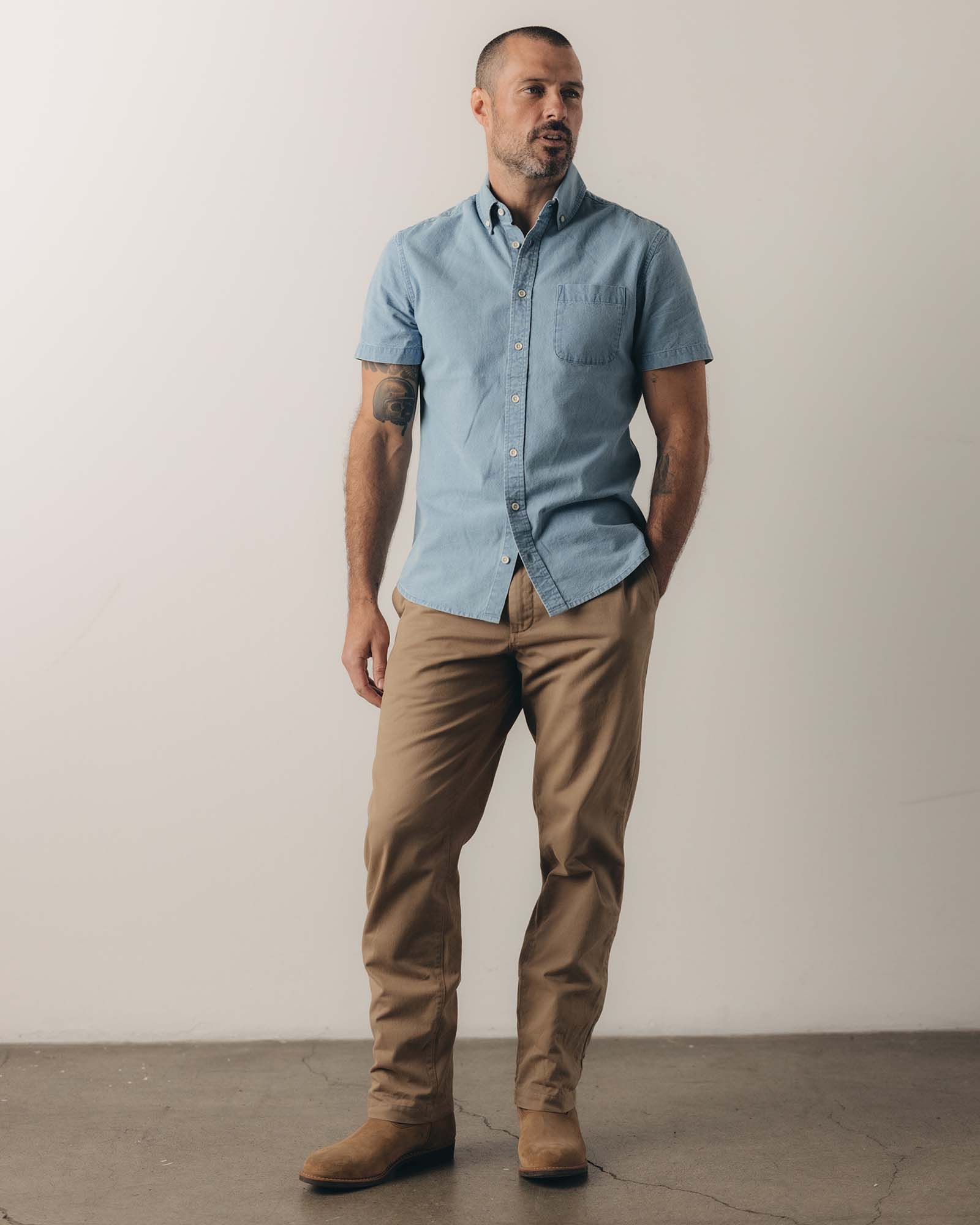 fit model showing off The Short Sleeve Jack in Washed Indigo Oxford, Wovens by Taylor Stitch