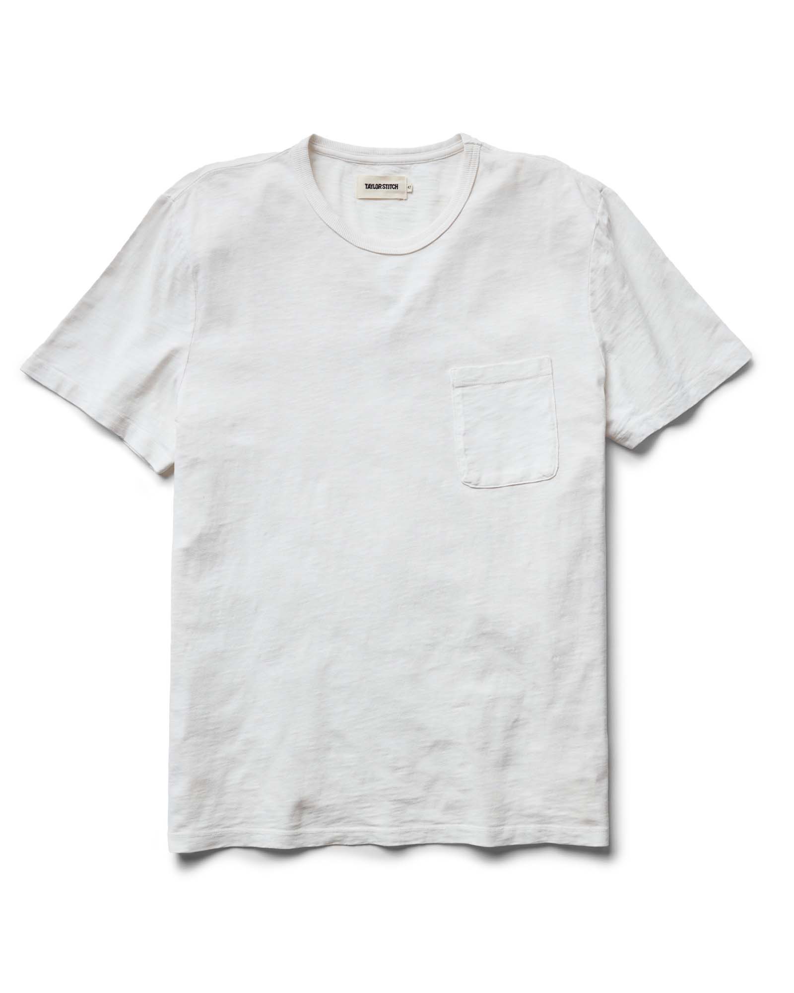 flatlay of The Slub Tee in White, Knits by Taylor Stitch
