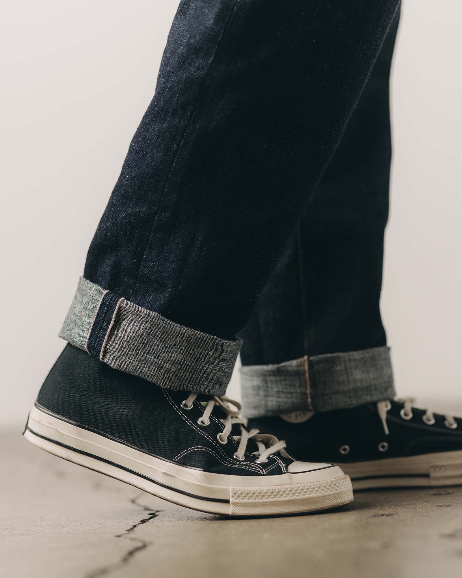 fit model showing off the cuffs on The Straight Jean in Rinsed Yoshiwa Selvedge, Bottoms by Taylor Stitch