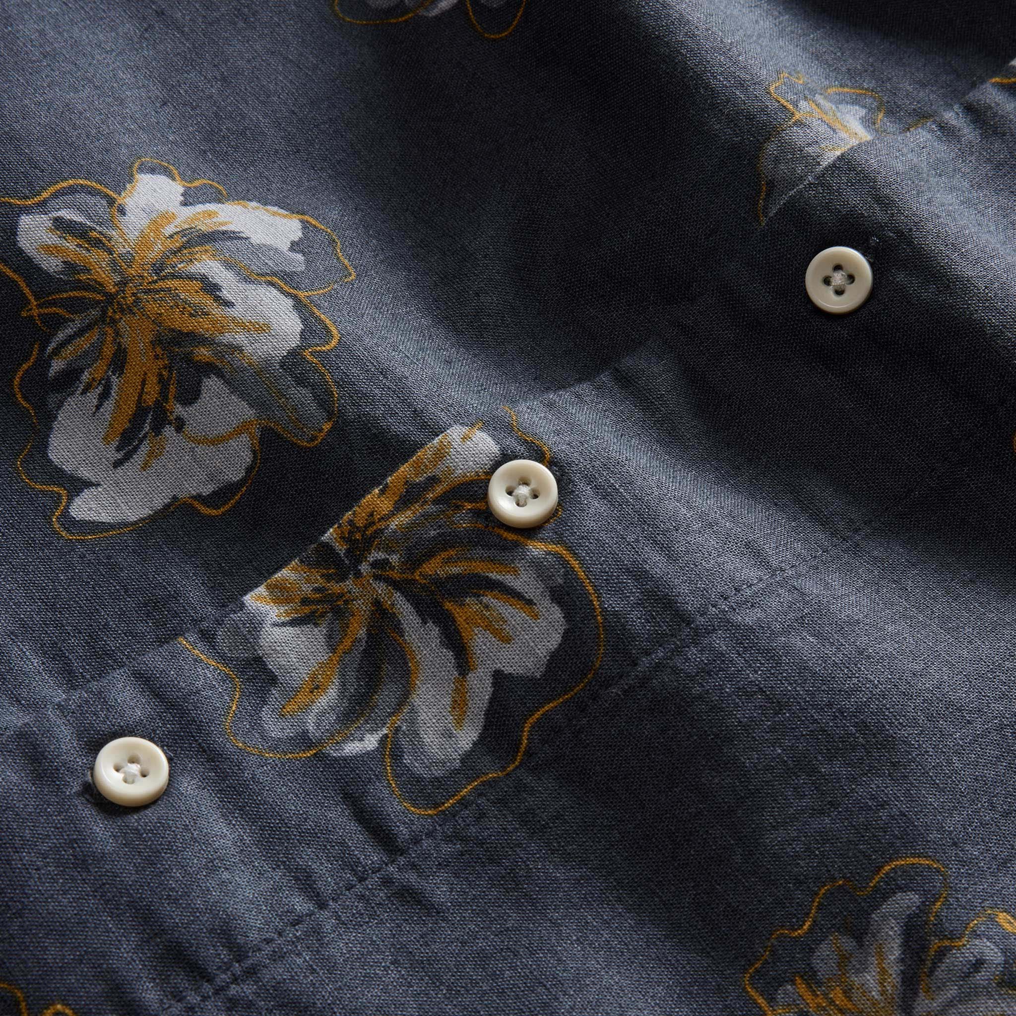 material shot of the buttons on The Conrad Shirt in Dark Blue Floral, Wovens by Taylor Stitch
