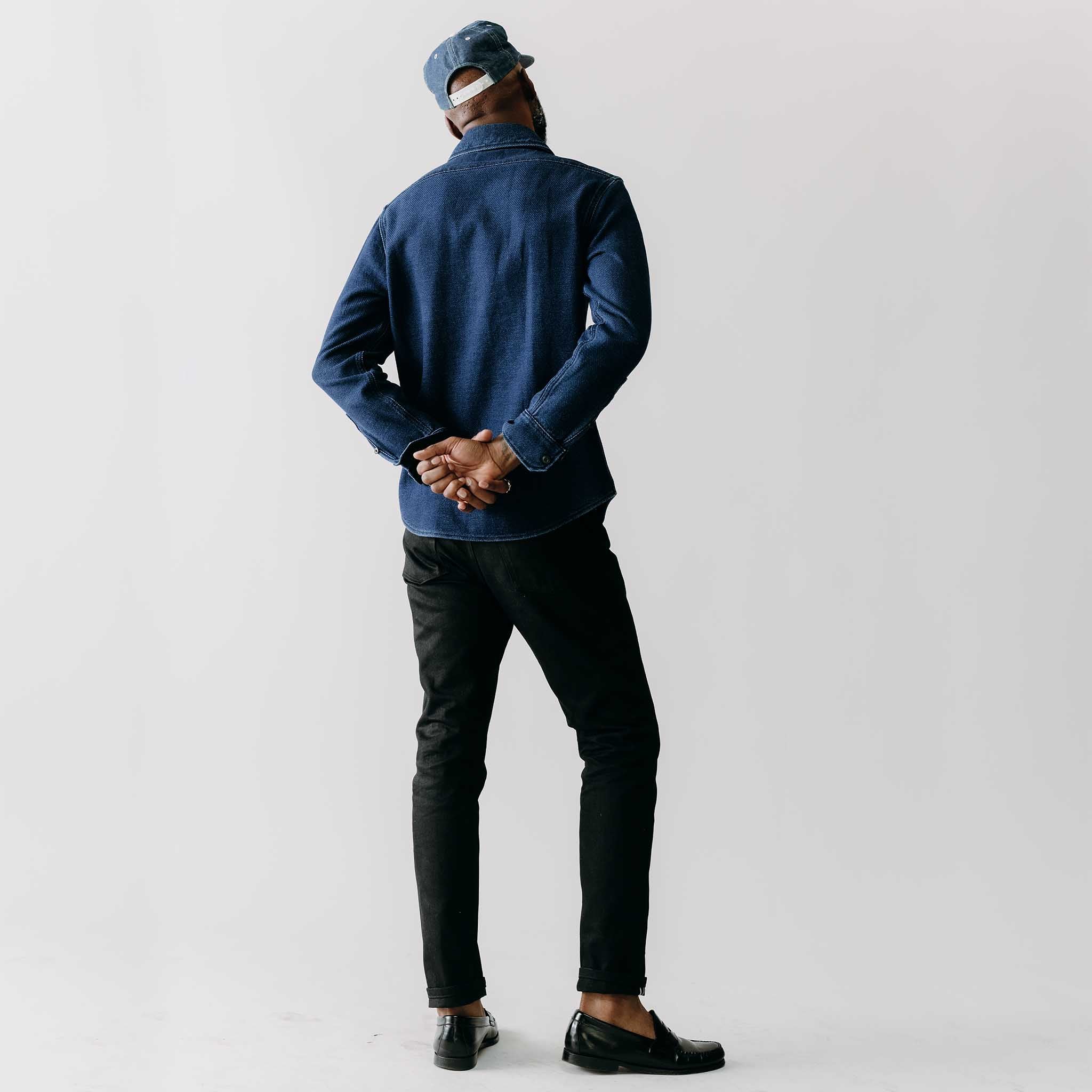 editorial image of The Division Shirt in Indigo Twill on a plant, Wovens by Taylor Stitch