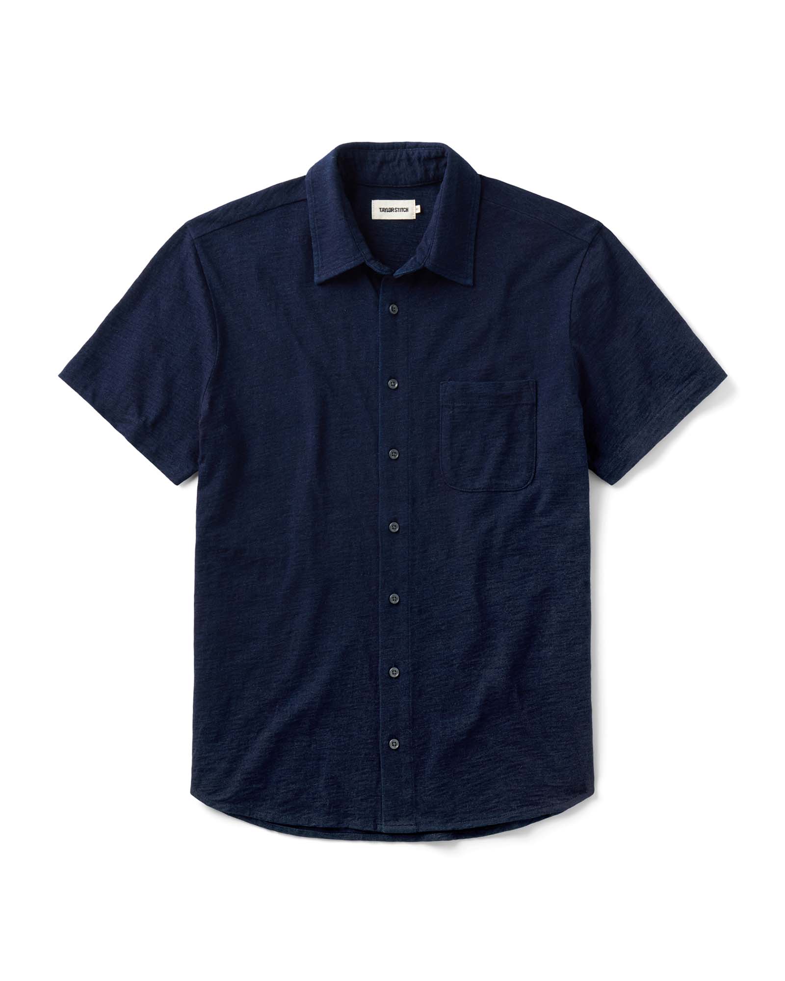 flatlay of The Short Sleeve California in Rinsed Indigo Slub, Knits by Taylor Stitch