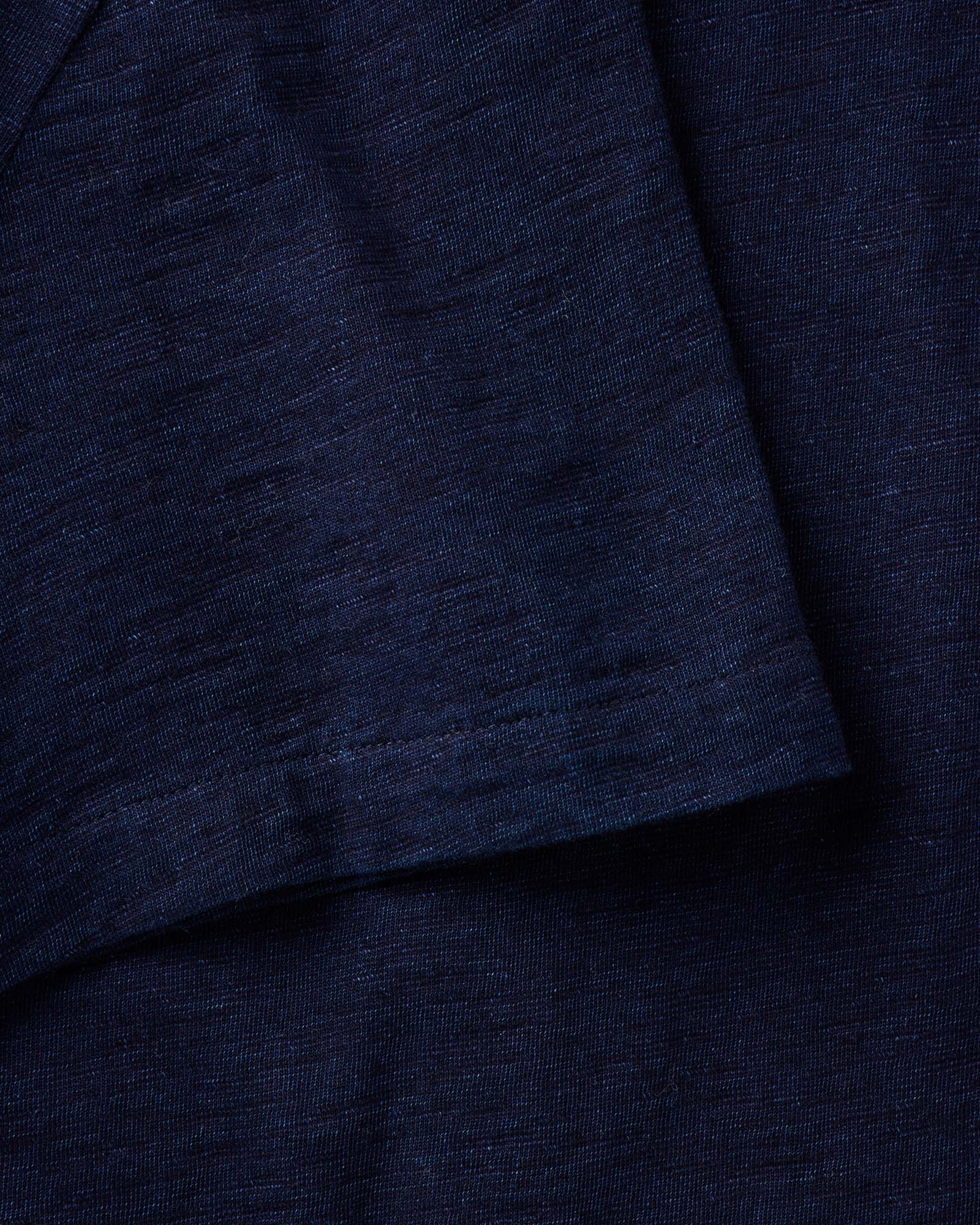 material shot of the fabric on The Short Sleeve California in Rinsed Indigo Slub, Knits by Taylor Stitch
