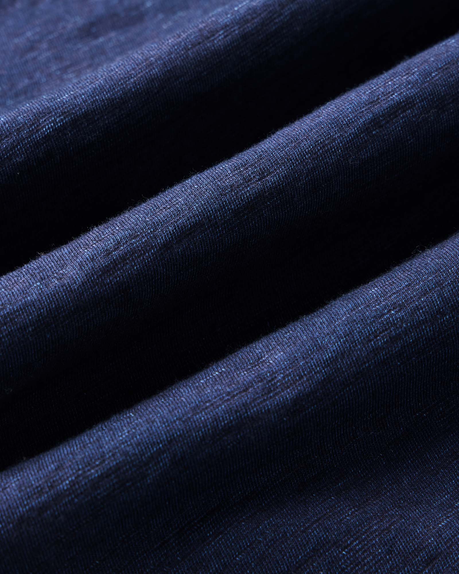 material shot of the pocket on The Short Sleeve California in Rinsed Indigo Slub, Knits by Taylor Stitch