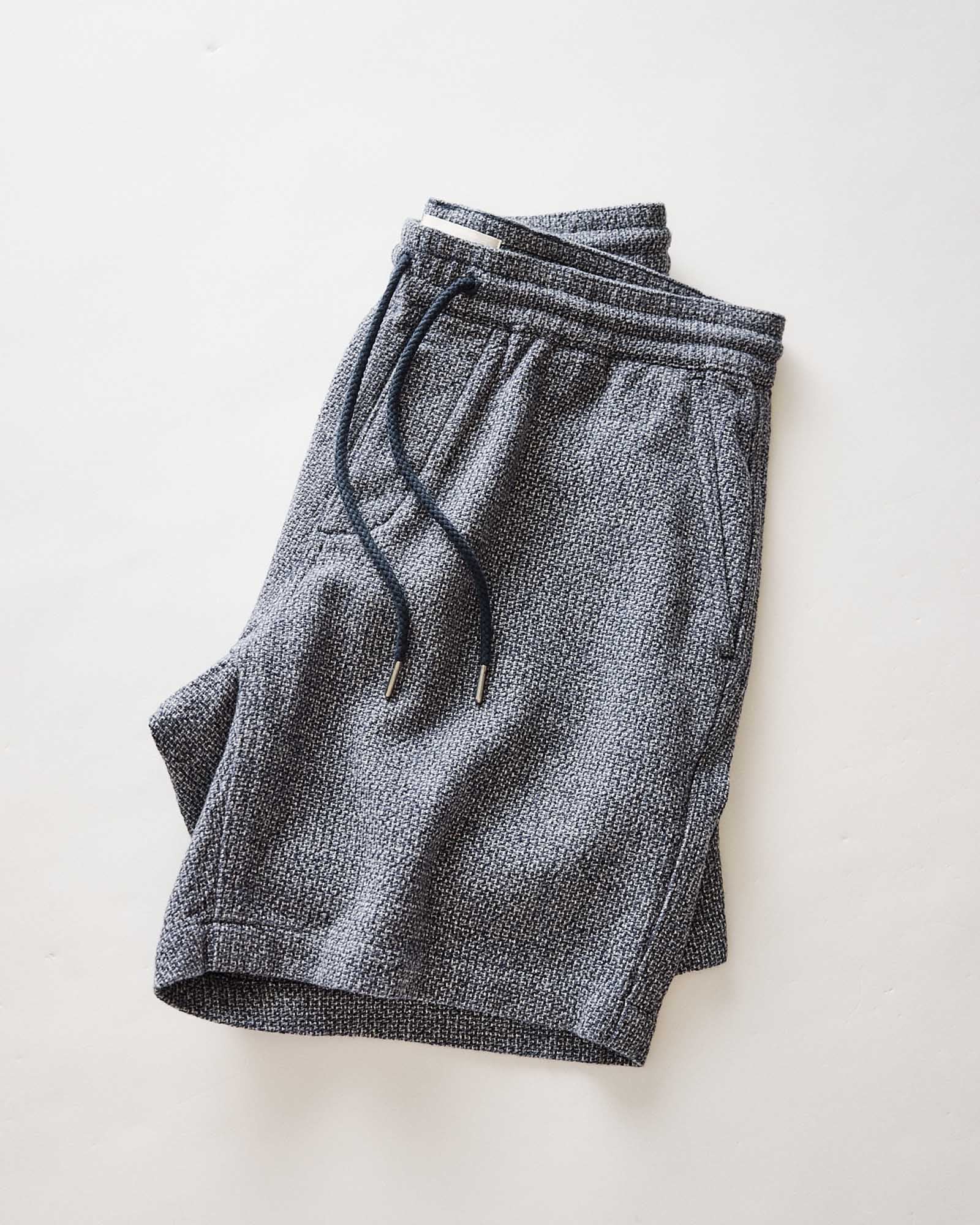 flatlay of The Apres Short in Navy Linen Tweed folded, Bottoms by Taylor Stitch